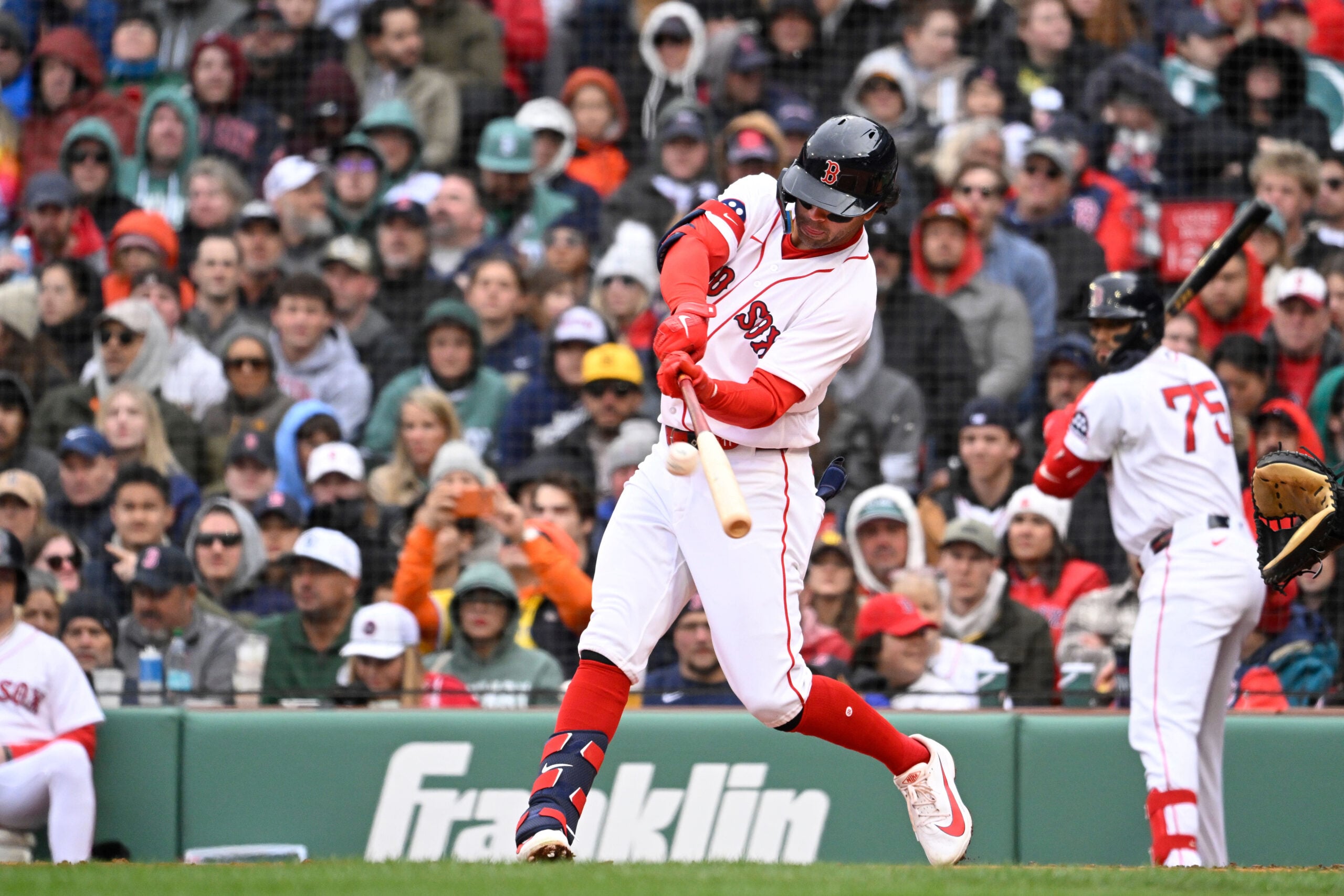 Apr 4, 2026; Foxborough, Massachusetts, USA; Boston Red Sox second baseman Marcelo Mayer (11) hits a sacrifice flyball during the second inning against the San Diego Padres at Fenway Park. Mandatory Credit: Eric Canha-Imagn Images