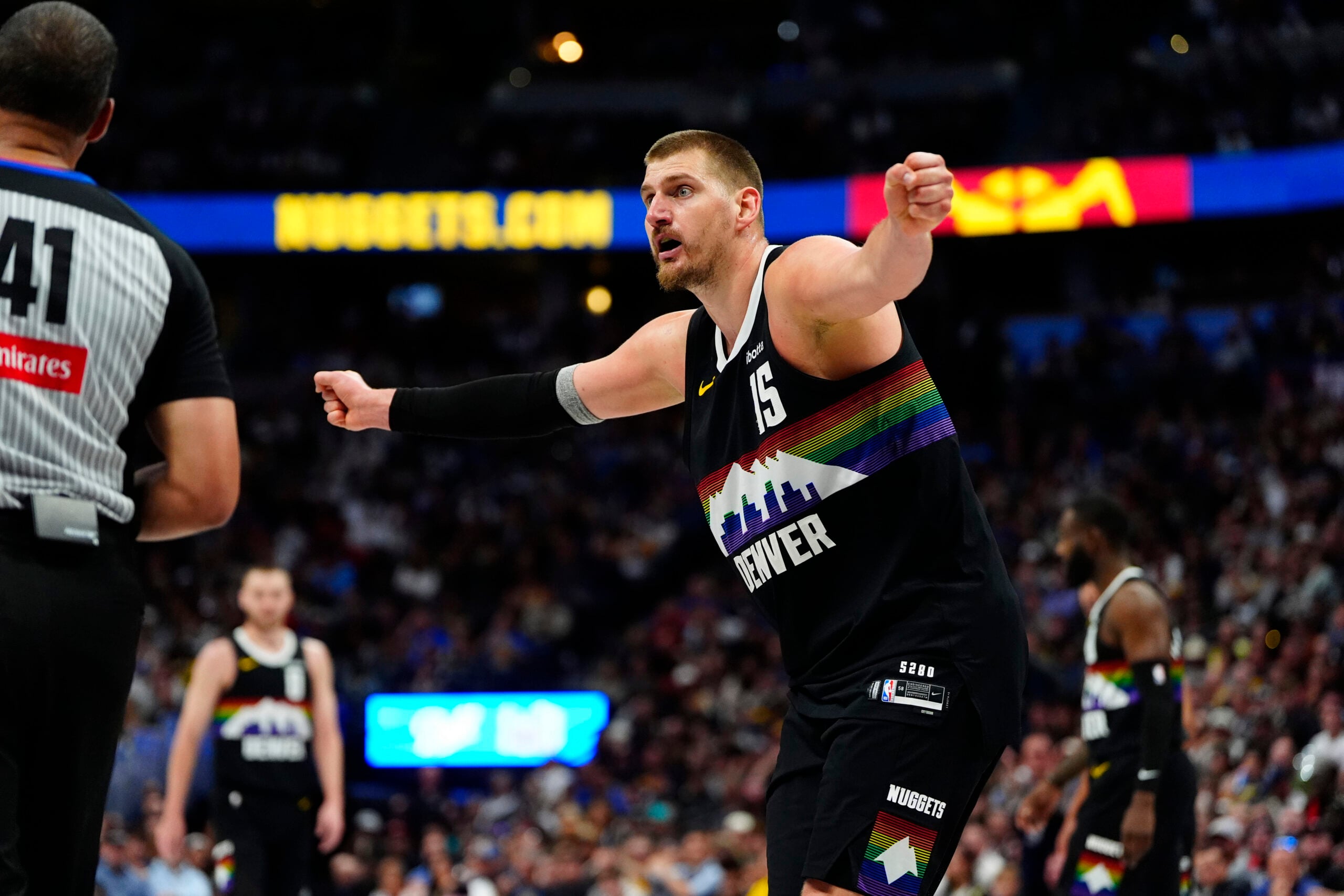 Apr 4, 2026; Denver, Colorado, USA; Denver Nuggets center Nikola Jokic (15) reacts towards a referee against the San Antonio Spurs at Ball Arena. Mandatory Credit: Ron Chenoy-Imagn Images