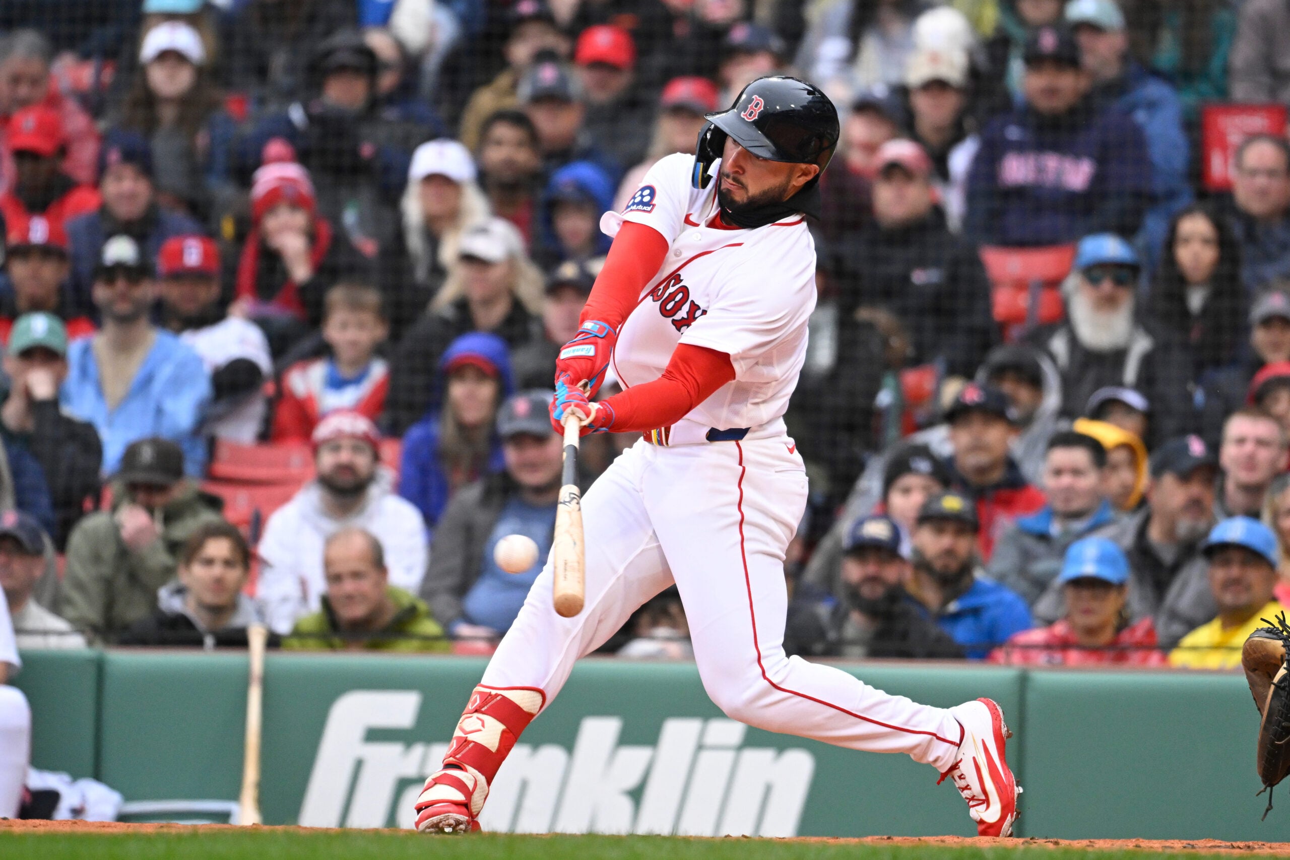 Apr 5, 2026; Boston, Massachusetts, USA;  Boston Red Sox right fielder Wilyer Abreu (52) hits a single against the San Diego Padres during the second inning at Fenway Park. Mandatory Credit: Eric Canha-Imagn Images