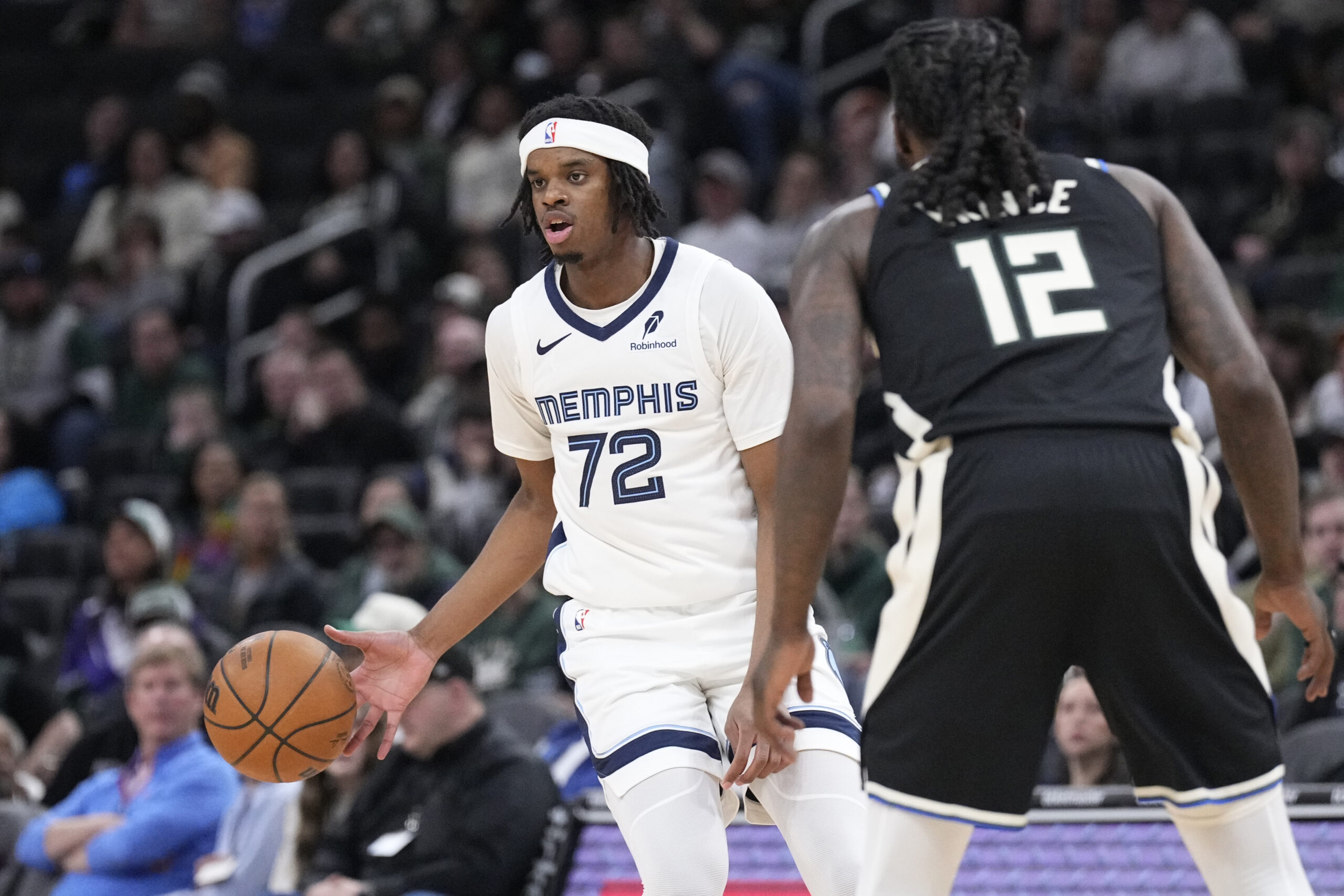 Apr 5, 2026; Milwaukee, Wisconsin, USA; Memphis Grizzlies forward Adam Bal brings the ball up the court against Milwaukee Bucks forward Taurean Prince (12) at Fiserv Forum. Mandatory Credit: Michael McLoone-Imagn Images