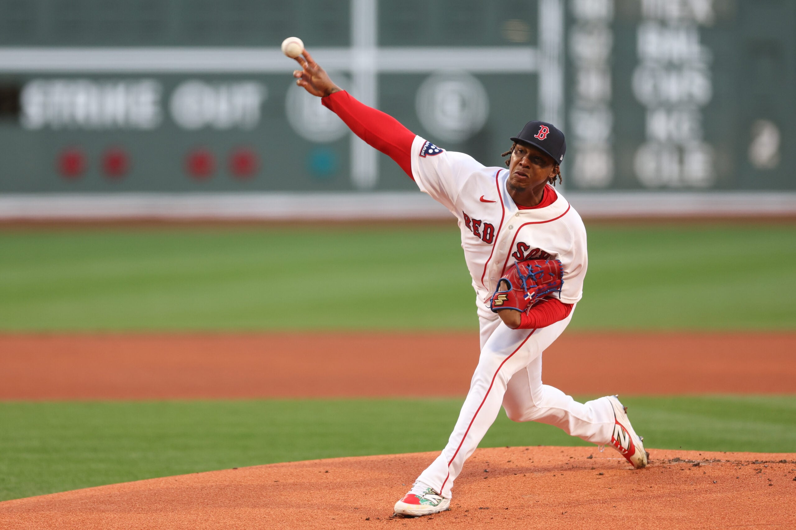 Apr 6, 2026; Boston, Massachusetts, USA; Boston Red Sox starting pitcher Brayan Bello (66) delivers a pitch during the first inning against the Milwaukee Brewers at Fenway Park. Mandatory Credit: Paul Rutherford-Imagn Images