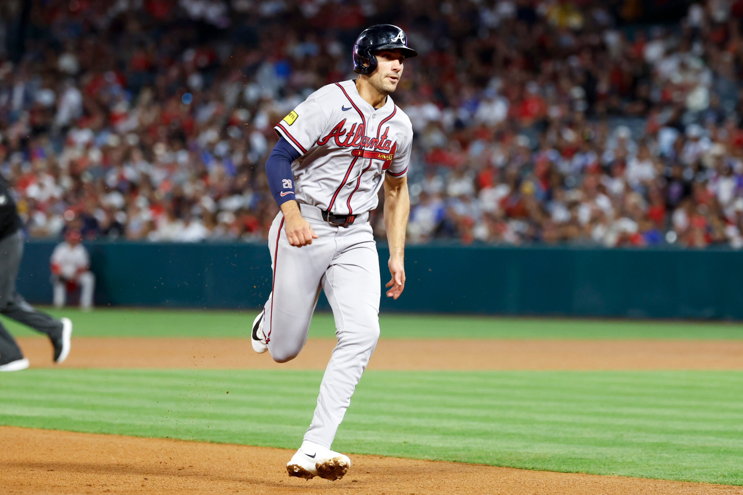 kApr 7, 2026; Anaheim, California, USA; Atlanta Braves first baseman Matt Olson (28) runs to third during the fourth inning against the Los Angeles Angels at Angel Stadium. Mandatory Credit: William Navarro-Imagn Images