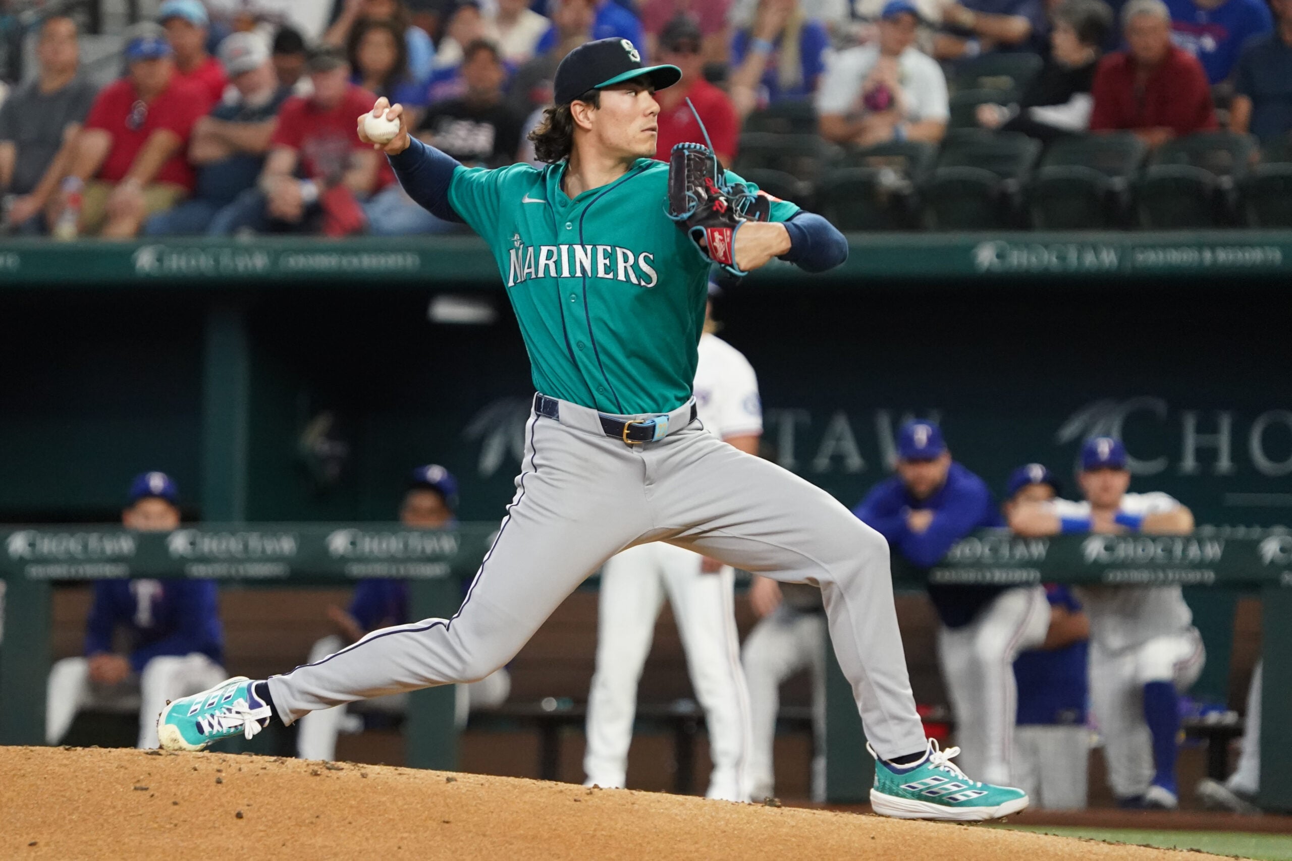 Apr 8, 2026; Arlington, Texas, USA;  Seattle Mariners pitcher Bryan Woo (22) throws to the plate during the first inning against the Texas Rangers at Globe Life Field. Mandatory Credit: Raymond Carlin III-Imagn Images