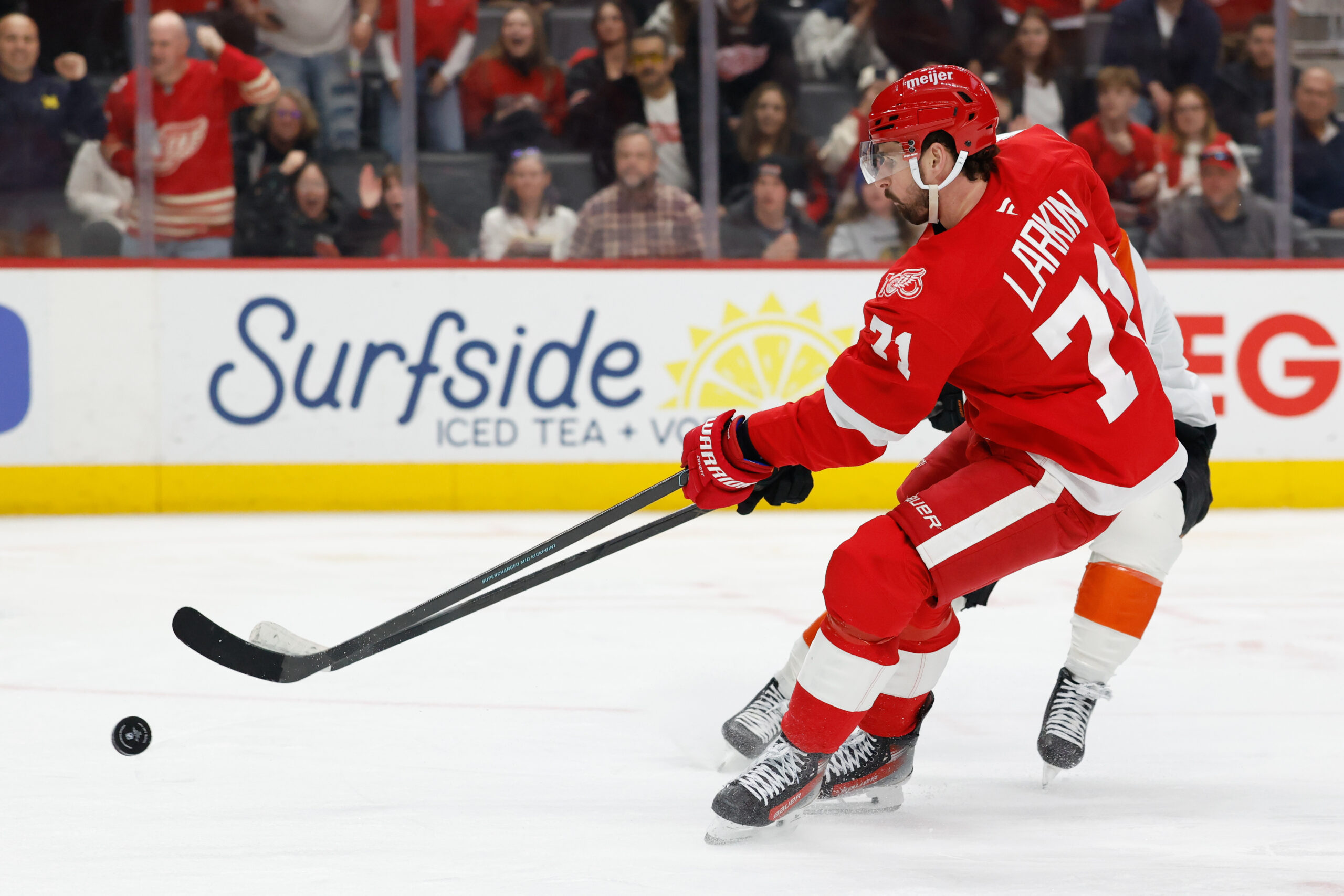 Mar 28, 2026; Detroit, Michigan, USA; Detroit Red Wings center Dylan Larkin (71) skates with the puck in the second period against the Philadelphia Flyers at Little Caesars Arena. Mandatory Credit: Rick Osentoski-Imagn Images