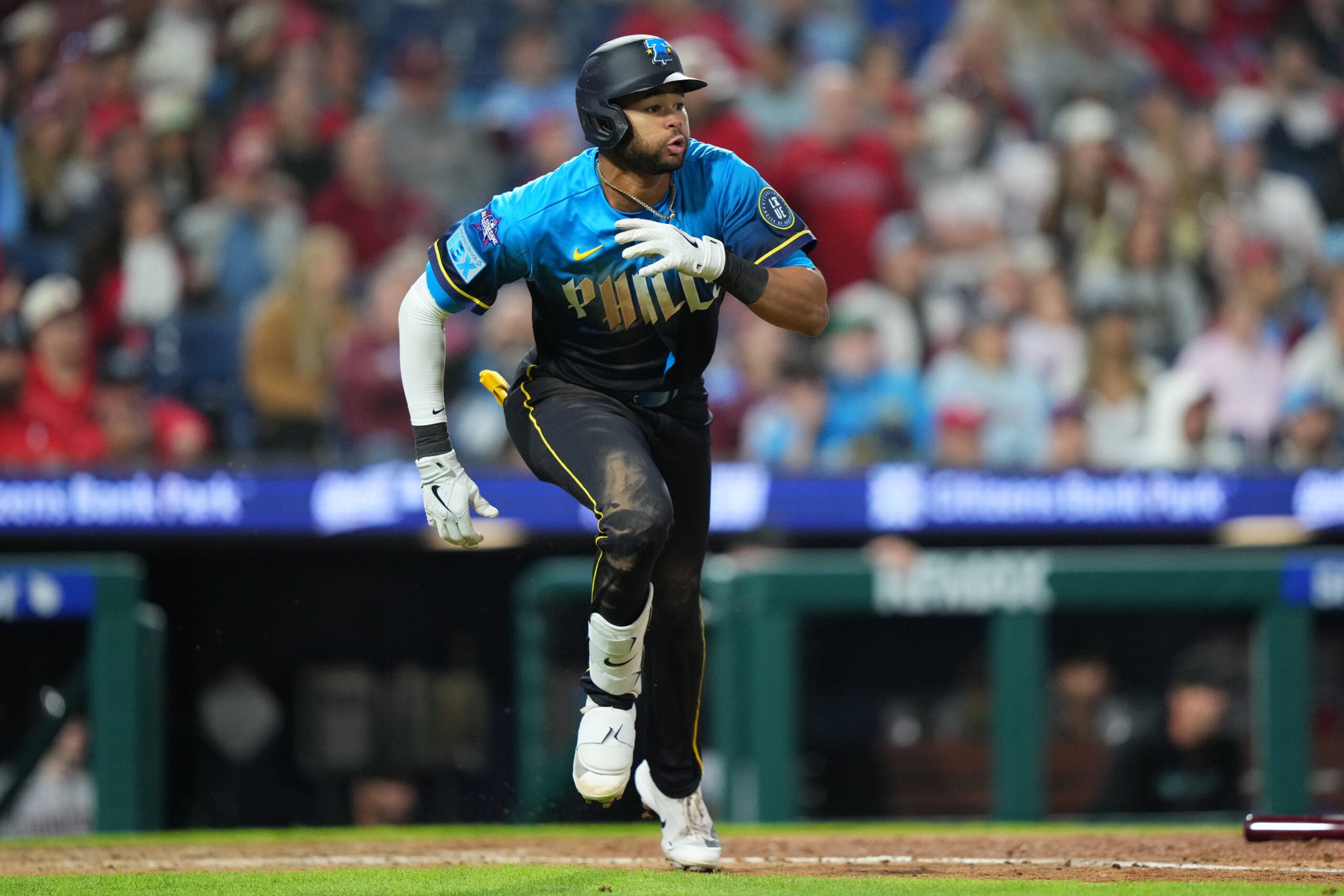 Apr 10, 2026; Philadelphia, Pennsylvania, USA; Philadelphia Phillies outfielder Justin Crawford (2) runs to first after hitting a triple against the Arizona Diamondbacks in the ninth inning at Citizens Bank Park. Mandatory Credit: Kyle Ross-Imagn Images