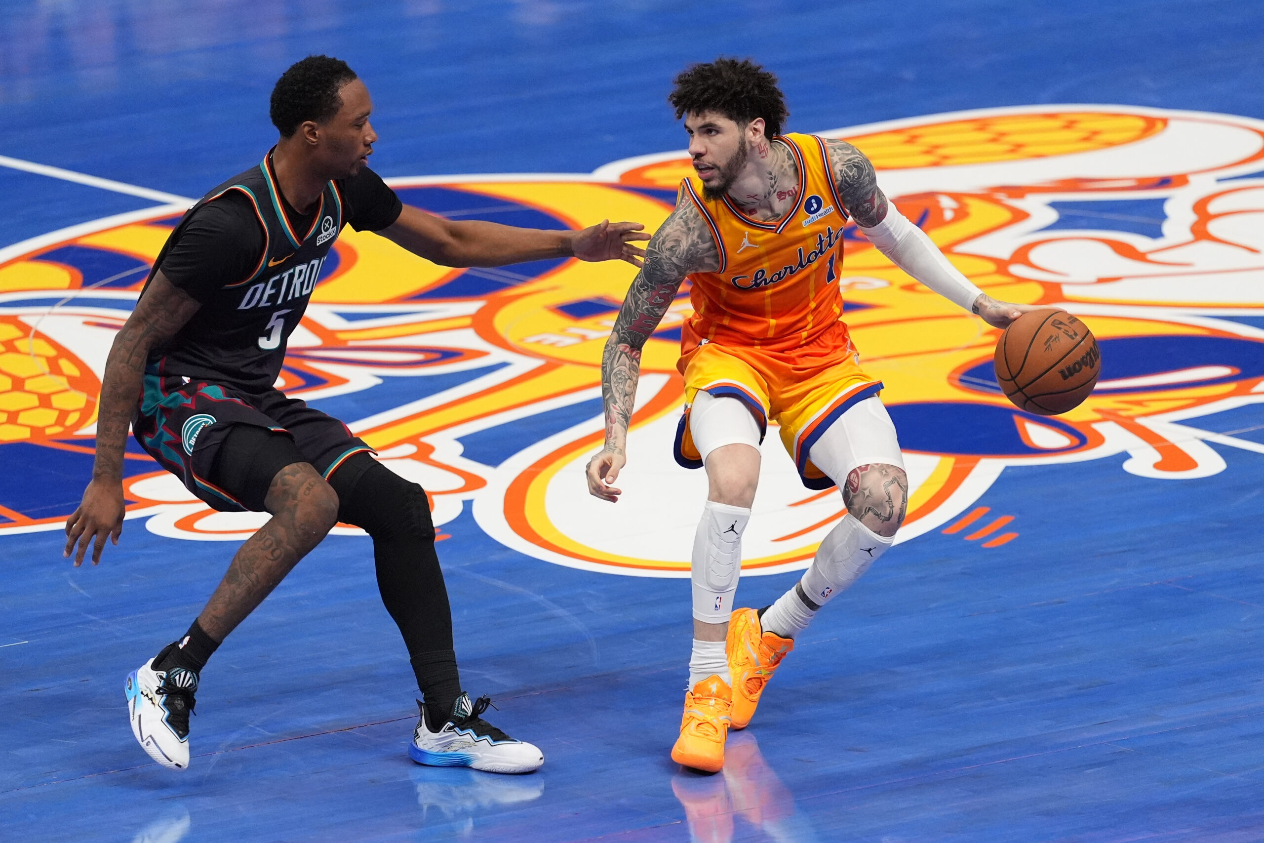 Apr 10, 2026; Charlotte, North Carolina, USA; Charlotte Hornets guard LaMelo Ball (1) brings the ball up court against Detroit Pistons forward Ronald Holland II (5) during the second half at Spectrum Center. Mandatory Credit: Jim Dedmon-Imagn Images