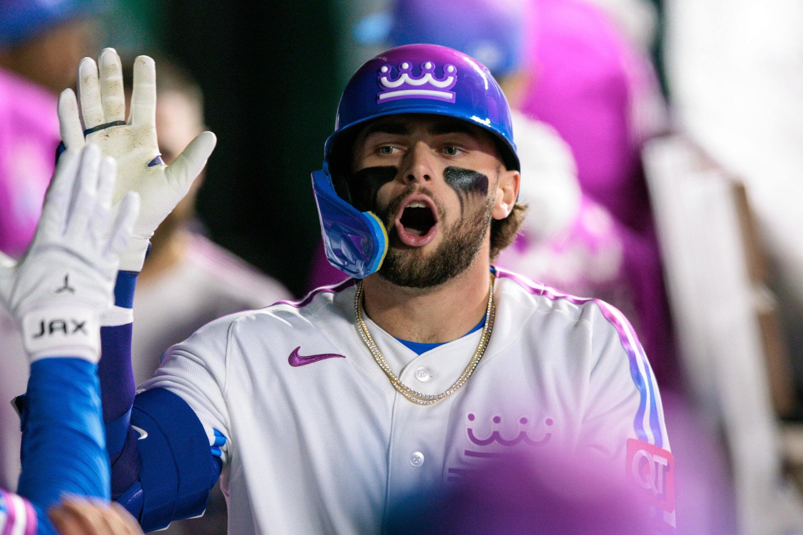 Apr 10, 2026; Kansas City, Missouri, USA; Kansas City Royals catcher Carter Jensen (22) celebrates in the dugout after a home run during the seventh inning against the Chicago White Sox at Kauffman Stadium. Mandatory Credit: William Purnell-Imagn Images