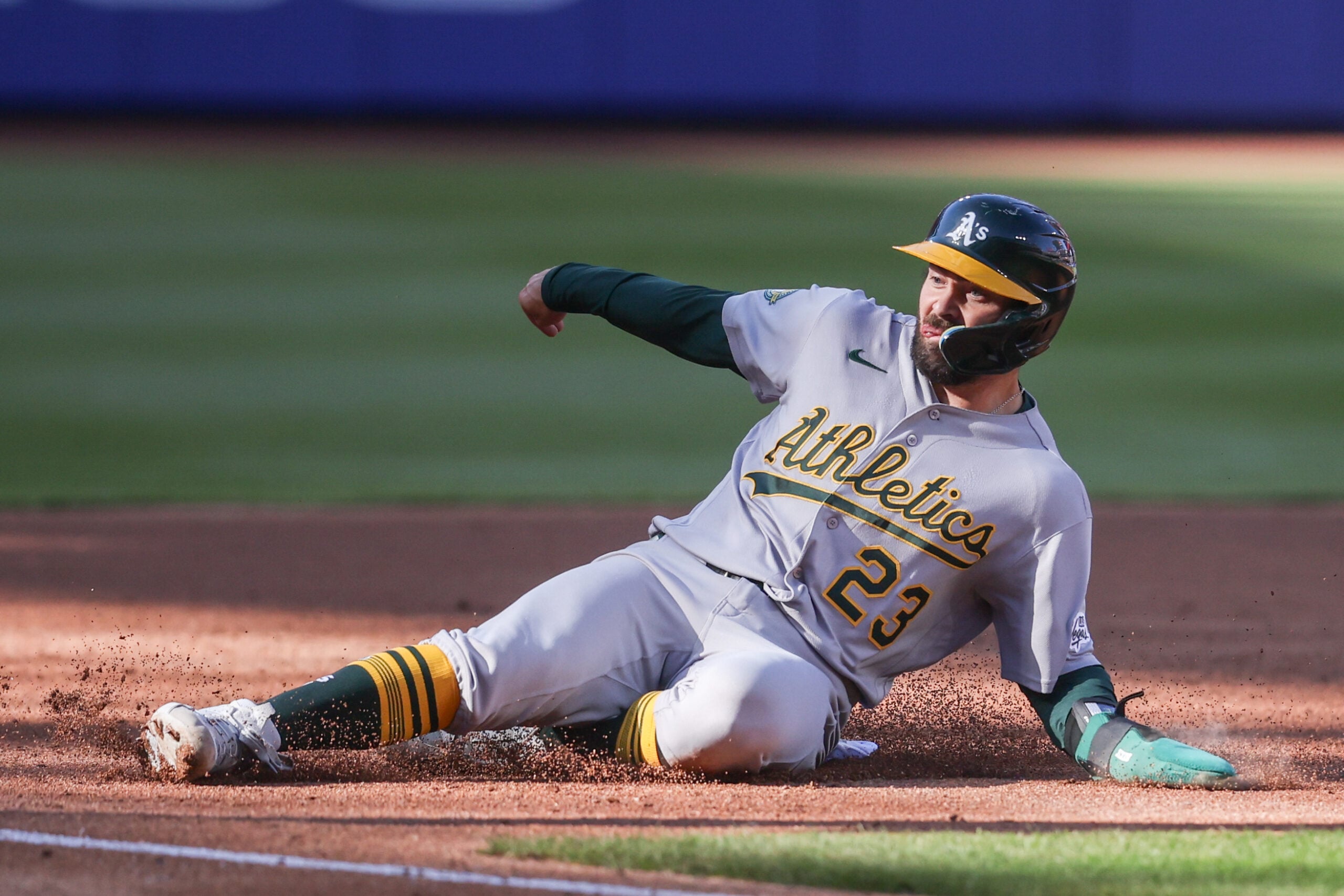 Apr 11, 2026; New York City, New York, USA;  Athletics catcher Shea Langeliers (23) slides safely into third base in the third inning against the New York Mets at Citi Field. Mandatory Credit: Wendell Cruz-Imagn Images
