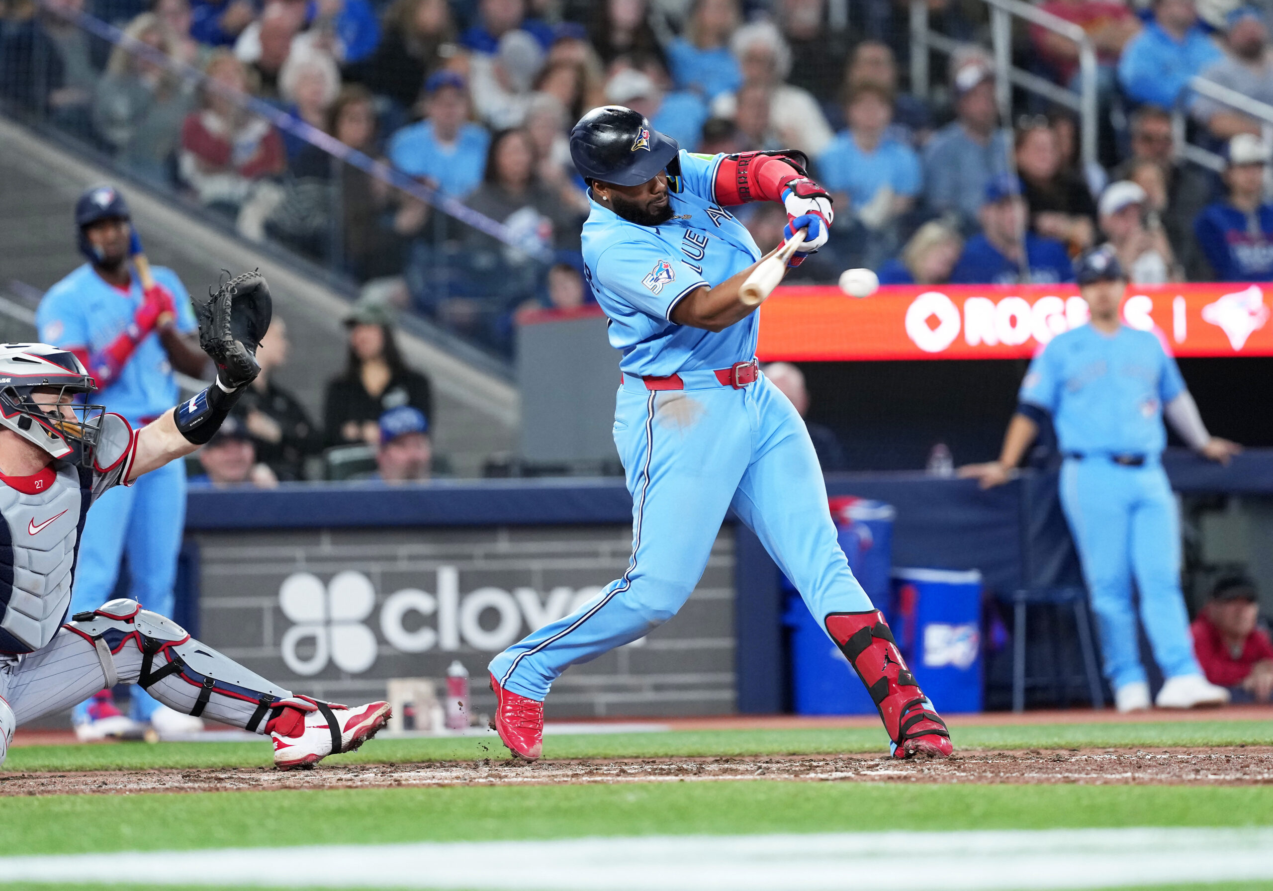 Apr 11, 2026; Toronto, Ontario, CAN; Toronto Blue Jays first baseman Vladimir Guerrero Jr. (27) hits a single against the Minnesota Twins during the ninth inning at Rogers Centre. Mandatory Credit: Nick Turchiaro-Imagn Images