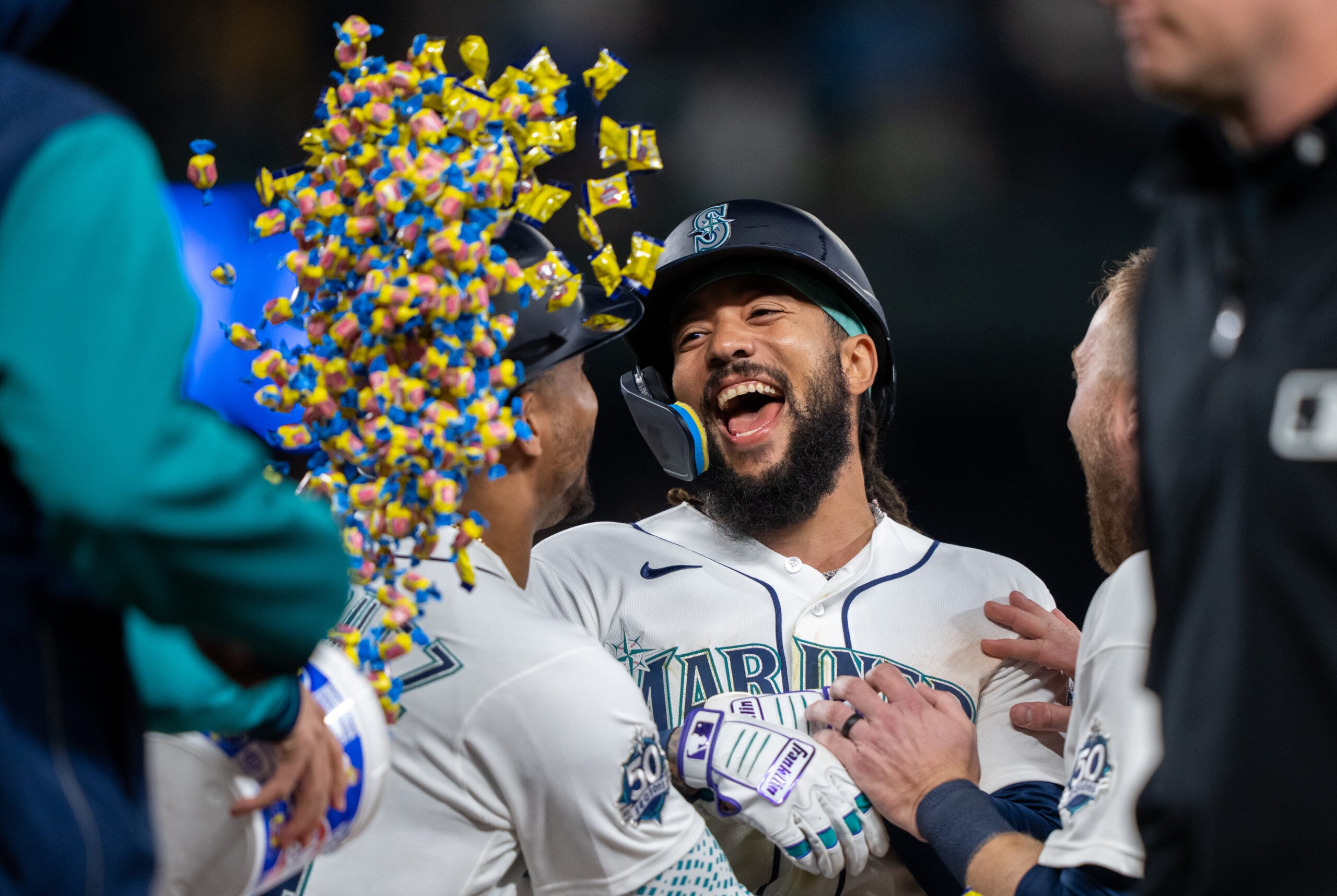 Apr 11, 2026; Seattle, Washington, USA; Seattle Mariners shortstop J.P. Crawford (3) celebrates with teammates after a game against the Houston Astros at T-Mobile Park. Mandatory Credit: Stephen Brashear-Imagn Images