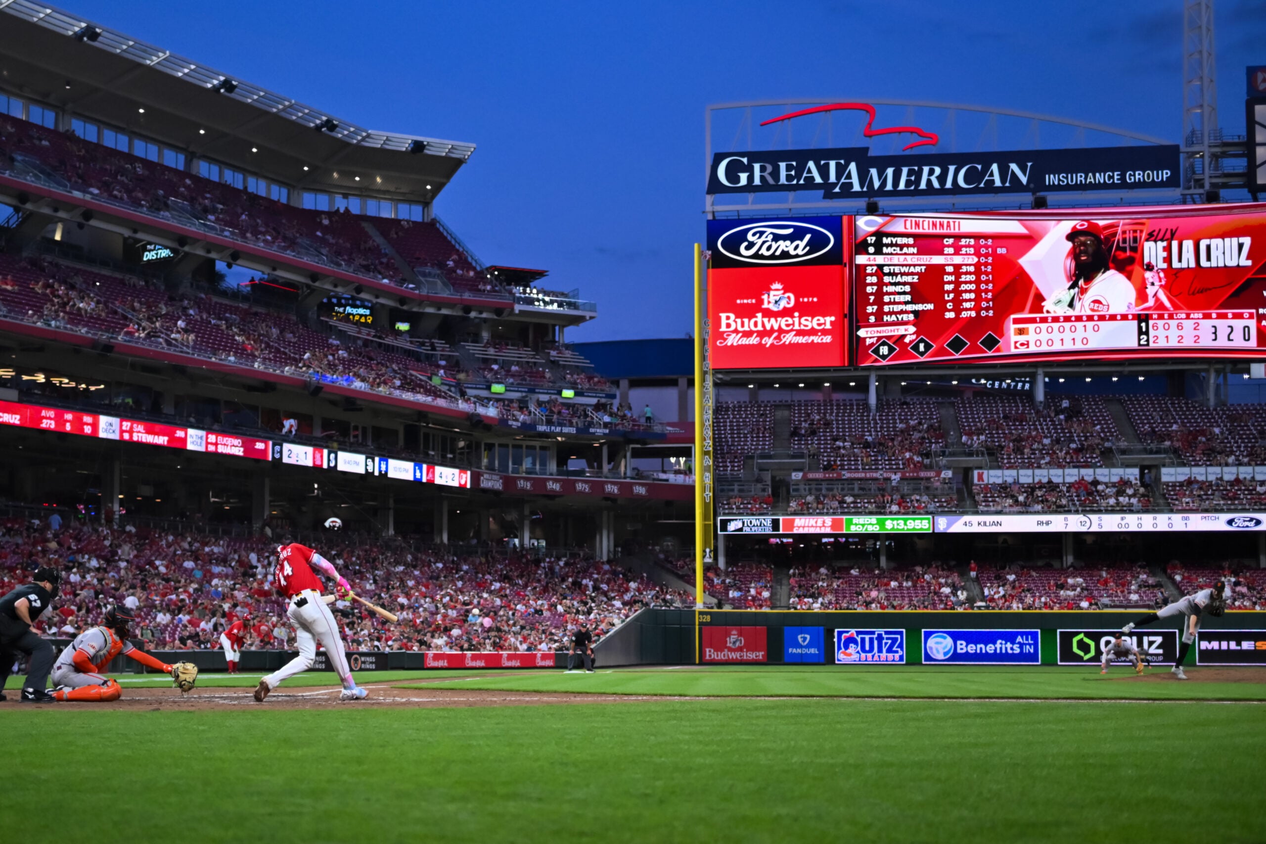 Apr 14, 2026; Cincinnati, Ohio, USA;  Cincinnati Reds shortstop Elly de la Cruz (44) singles against the San Francisco Giants in the sixth inning at Great American Ball Park. Mandatory Credit: Aaron Doster-Imagn Images