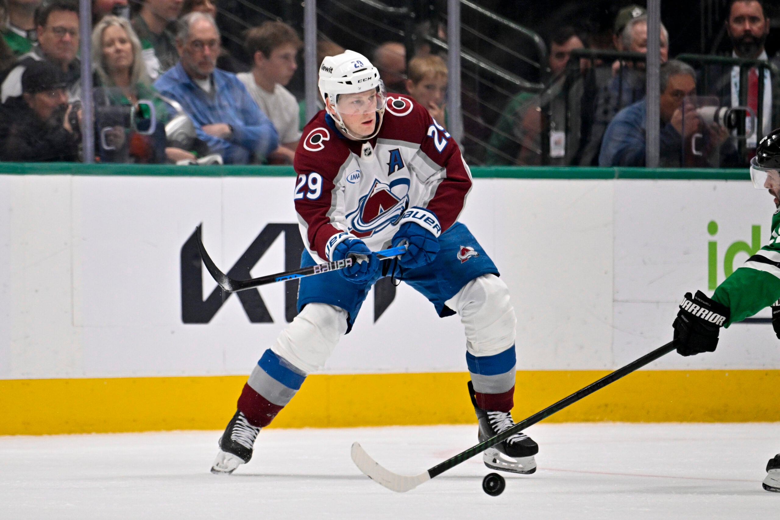 Apr 4, 2026; Dallas, Texas, USA; Colorado Avalanche center Nathan MacKinnon (29) skates against the Dallas Stars during the game between the Stars and the Avalanche at American Airlines Center. Mandatory Credit: Jerome Miron-Imagn Images