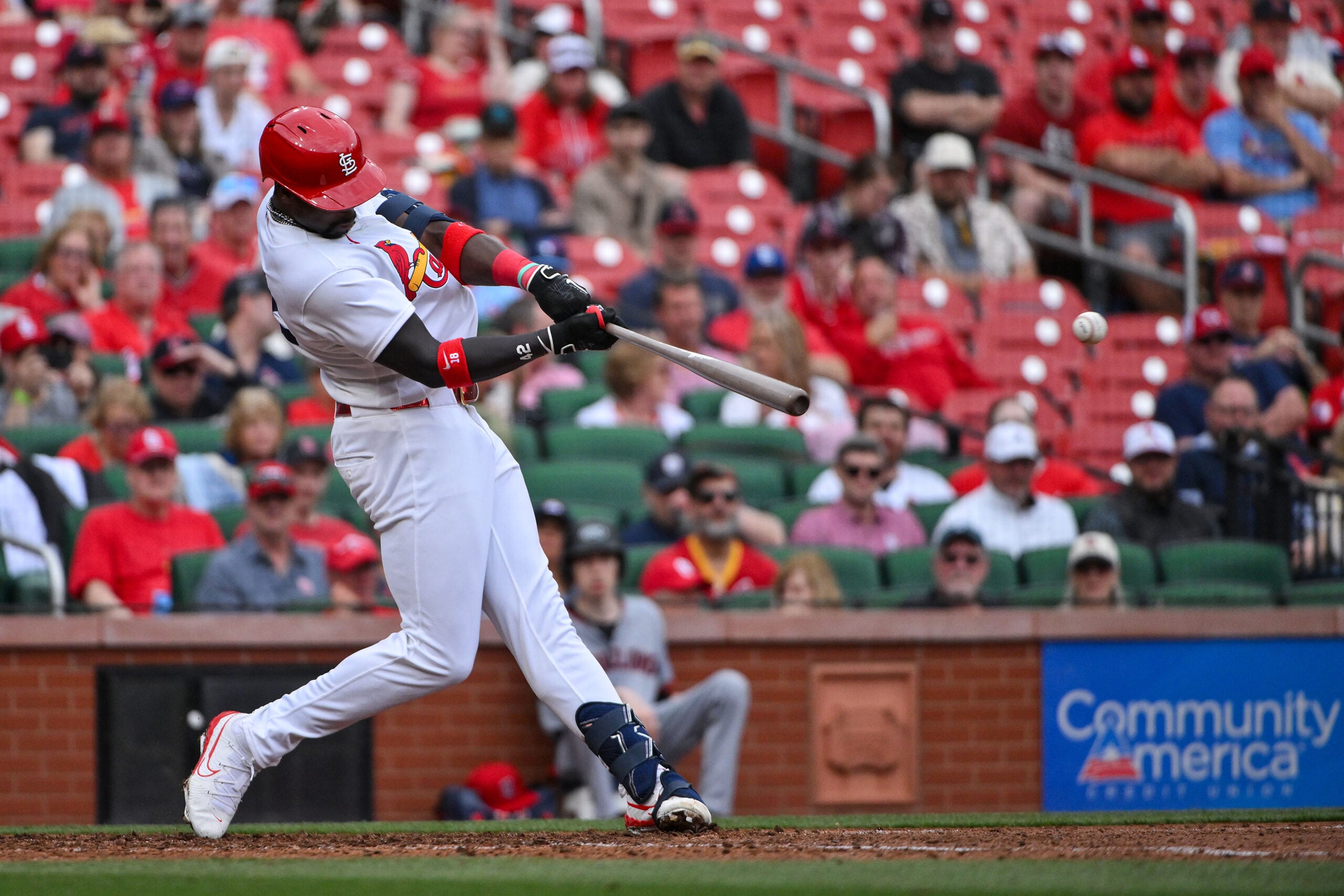 Apr 15, 2026; St. Louis, Missouri, USA; St. Louis Cardinals right fielder Jordan Walker (18) hits a double against the Cleveland Guardians during the eighth inning at Busch Stadium. Players and coaches are wearing number 42 in recognition of Jackie Robinson Day. Mandatory Credit: Jeff Curry-Imagn Images