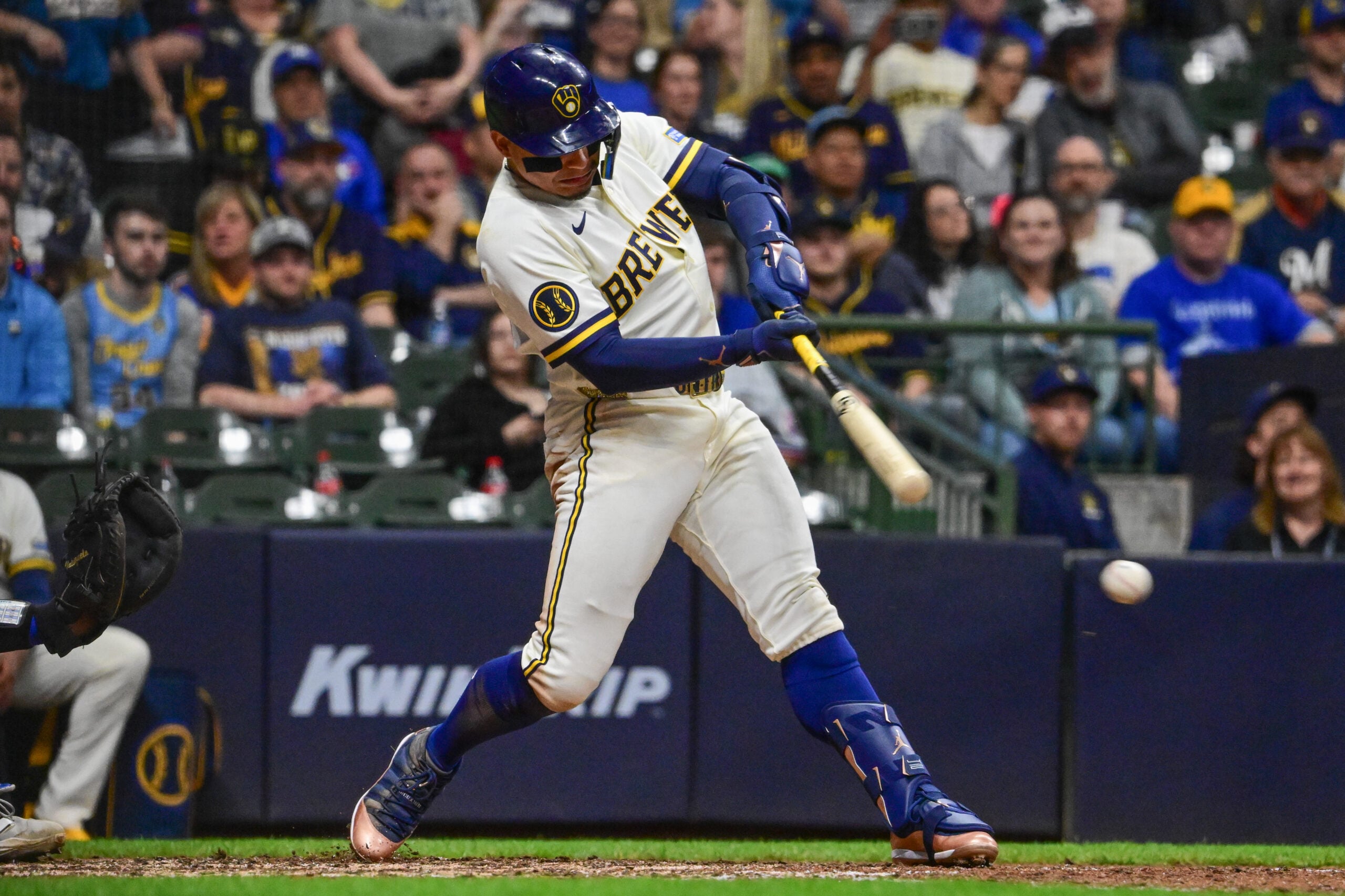 Apr 15, 2026; Milwaukee, Wisconsin, USA; Milwaukee Brewers designated hitter William Contreras (24) hits a single to drive in a run in the eighth inning against the Toronto Blue Jays at American Family Field. Mandatory Credit: Benny Sieu-Imagn Images