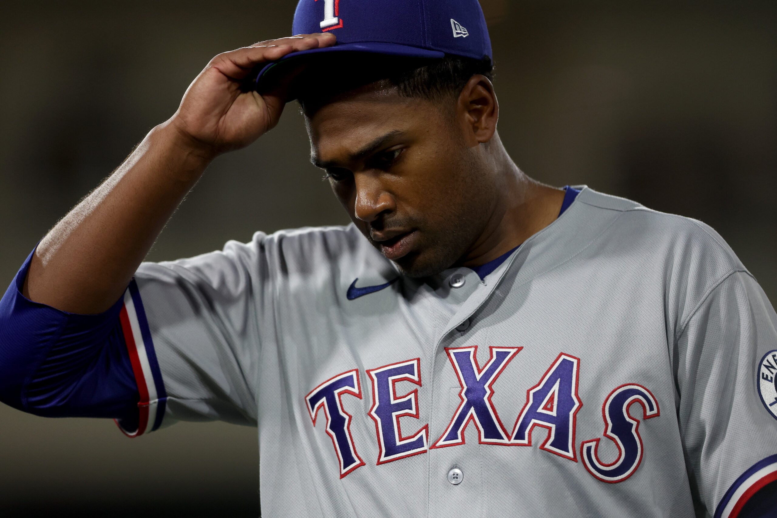 Apr 15, 2026; West Sacramento, California, USA; Texas Rangers starting pitcher Kumar Rocker (80) walks back towards the dugout after being removed from the game against the Athletics during the fifth inning at Sutter Health Park. Mandatory Credit: Dennis Lee-Imagn Images