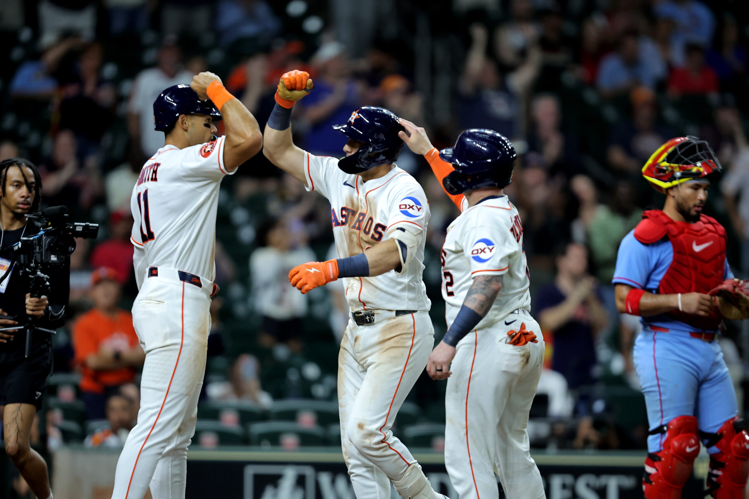 Apr 18, 2026; Houston, Texas, USA; Houston Astros third baseman Shay Whitcomb (14) is congratulated by teammates after hitting a three-run home run against the St. Louis Cardinals during the ninth inning at Daikin Park. Mandatory Credit: Erik Williams-Imagn Images