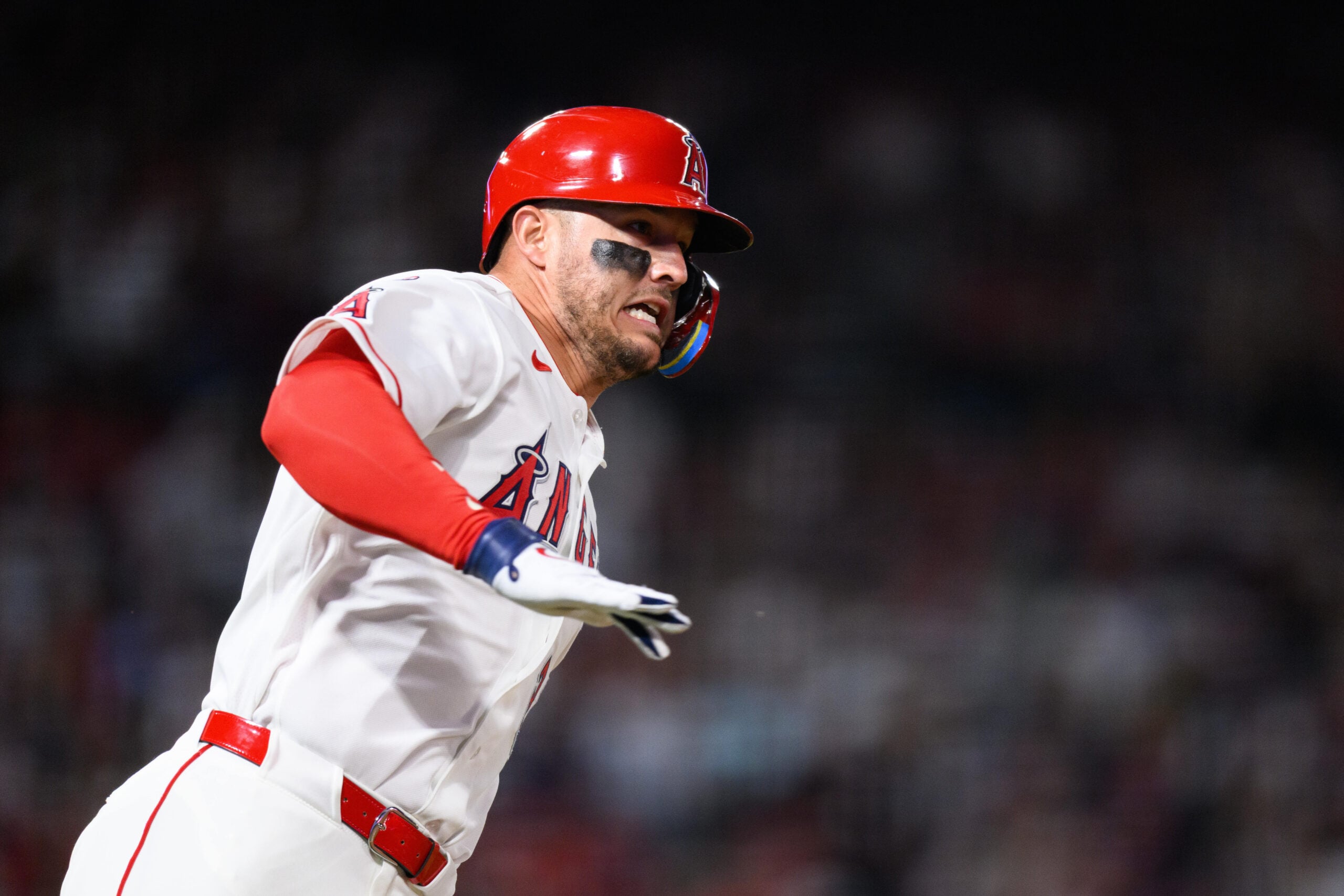 Apr 18, 2026; Anaheim, California, USA; Los Angeles Angels center fielder Mike Trout (27) runs after hitting a double during the sixth inning against the San Diego Padres at Angel Stadium. Mandatory Credit: William Liang-Imagn Images