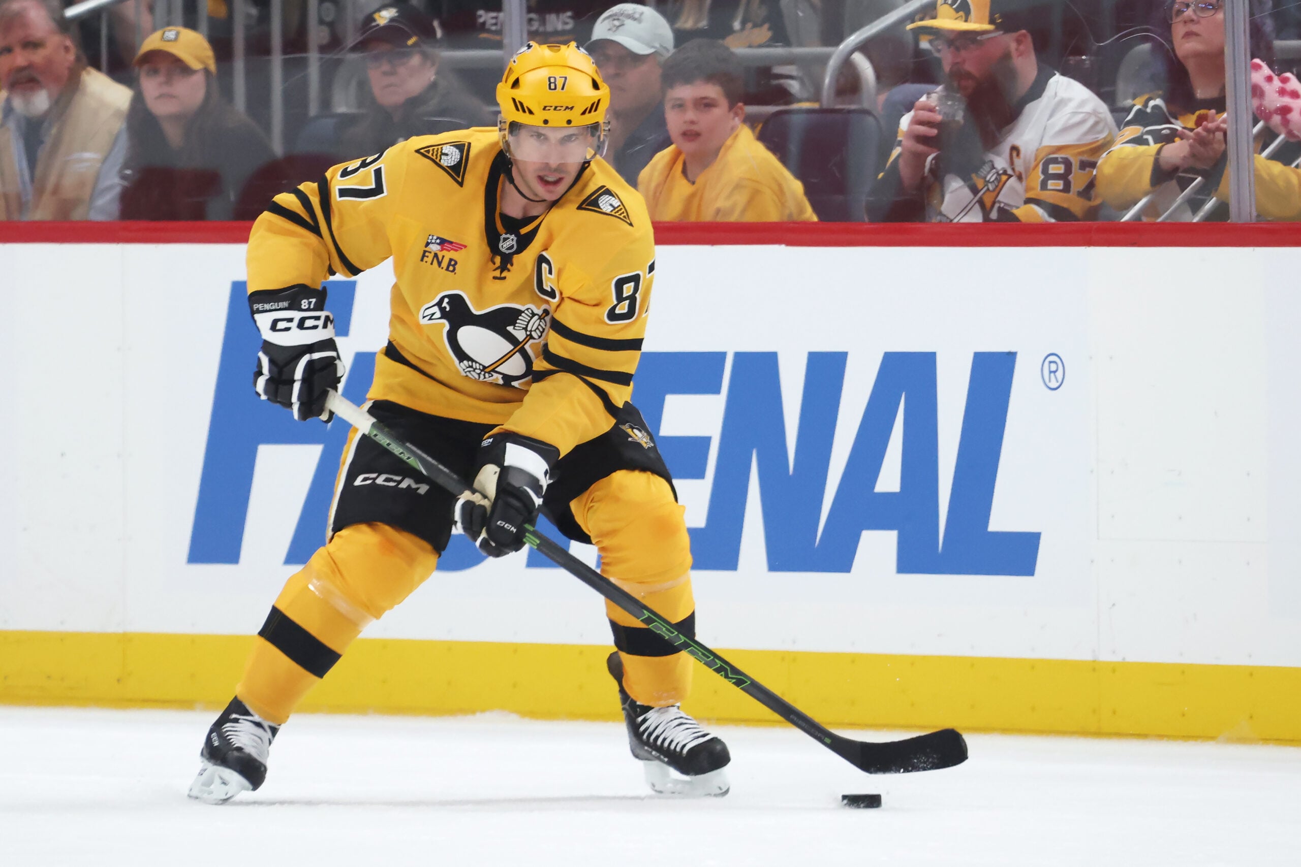 Apr 18, 2026; Pittsburgh, Pennsylvania, USA; Pittsburgh Penguins center Sidney Crosby (87) handles the puck against the Philadelphia Flyers during the second period in game one of the first round of the 2026 Stanley Cup Playoffs at PPG Paints Arena. Mandatory Credit: Charles LeClaire-Imagn Images