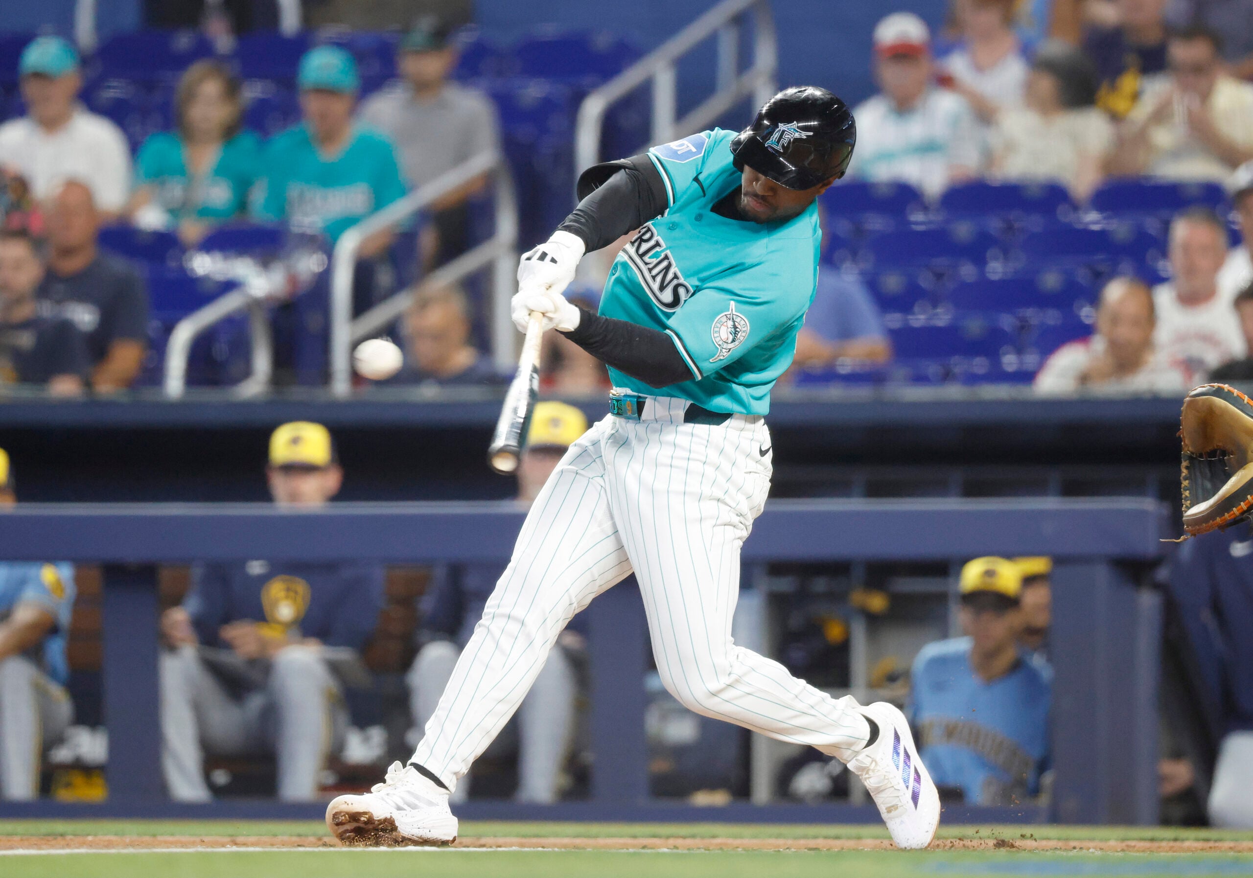 Apr 19, 2026; Miami, Florida, USA;  Miami Marlins shortstop Xavier Edwards (9) at bat against the Milwaukee Brewers during the first inning at loanDepot Park. Mandatory Credit: Rhona Wise-Imagn Images
