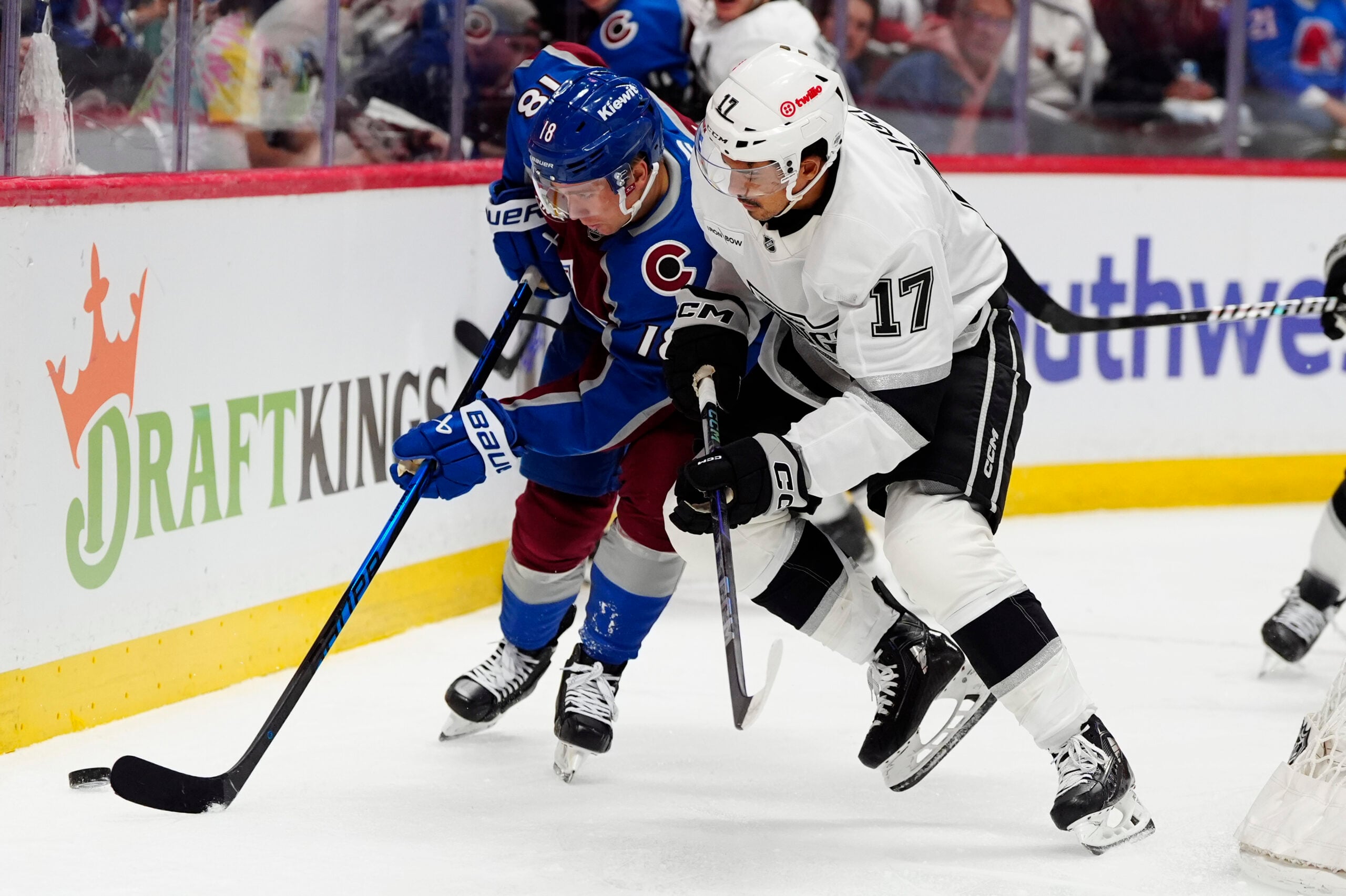 Apr 19, 2026; Denver, Colorado, USA; Los Angeles Kings right wing Mathieu Joseph (17) and Colorado Avalanche center Jack Drury (18) in the second period in game one of the first round of the 2026 Stanley Cup Playoffs at Ball Arena. Mandatory Credit: Ron Chenoy-Imagn Images