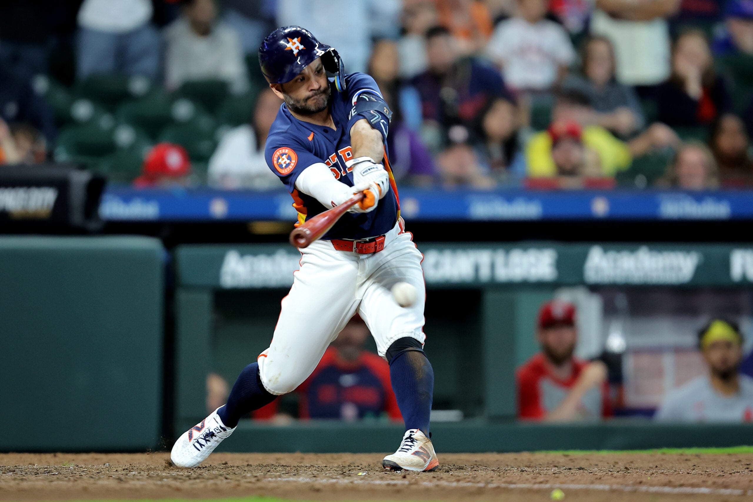 Apr 19, 2026; Houston, Texas, USA; Houston Astros second baseman Jose Altuve (27) hits an RBI infield single against the St. Louis Cardinals during the 10th inning at Daikin Park. Mandatory Credit: Erik Williams-Imagn Images