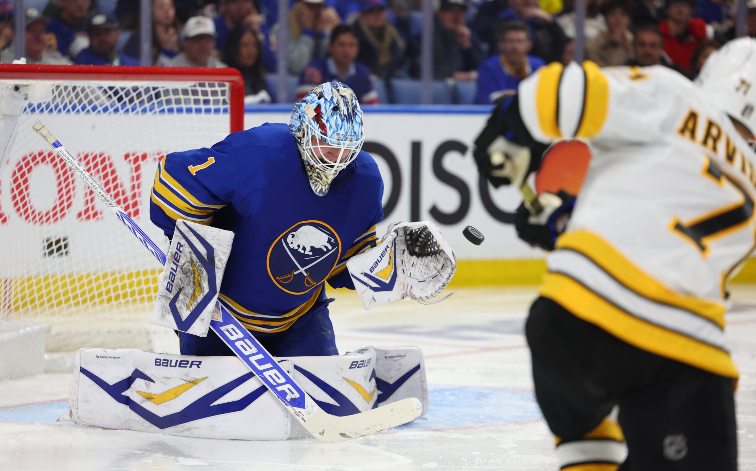 Apr 21, 2026; Buffalo, New York, USA; Boston Bruins left wing Viktor Arvidsson (71) scores a goal on Buffalo Sabres goaltender Ukko-Pekka Luukkonen (1) during the third period in game two of the first round of the 2026 Stanley Cup Playoffs at KeyBank Center. Mandatory Credit: Timothy T. Ludwig-Imagn Images