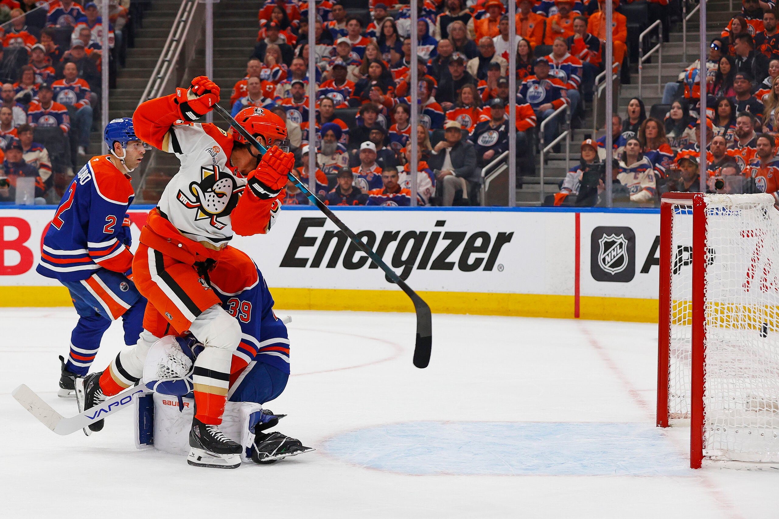 Apr 22, 2026; Edmonton, Alberta, CAN; Anaheim Ducks forward Ryan Poehling (25) tips a shot past Edmonton Oilers goaltender Connor Ingram (39) during the second period in game two of the first round of the 2026 Stanley Cup Playoffs at Rogers Place. Mandatory Credit: Perry Nelson-Imagn Images