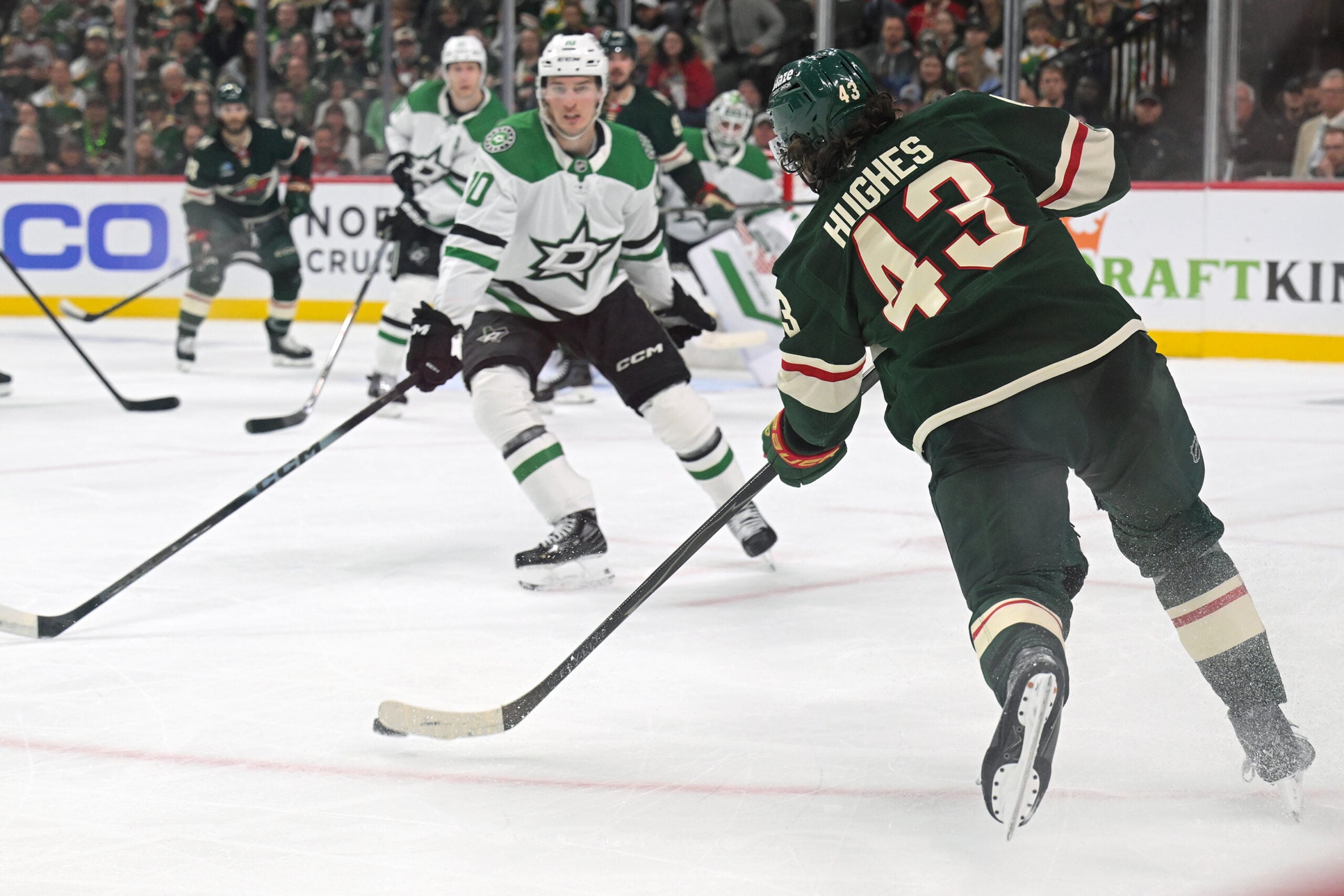 Apr 25, 2026; Saint Paul, Minnesota, USA; Minnesota Wild defensemen Quinn Hughes (43) makes a pass against the Dallas Stars during the second period in game four of the first round of the 2026 Stanley Cup Playoffs at Grand Casino Arena. Mandatory Credit: Nick Wosika-Imagn Images