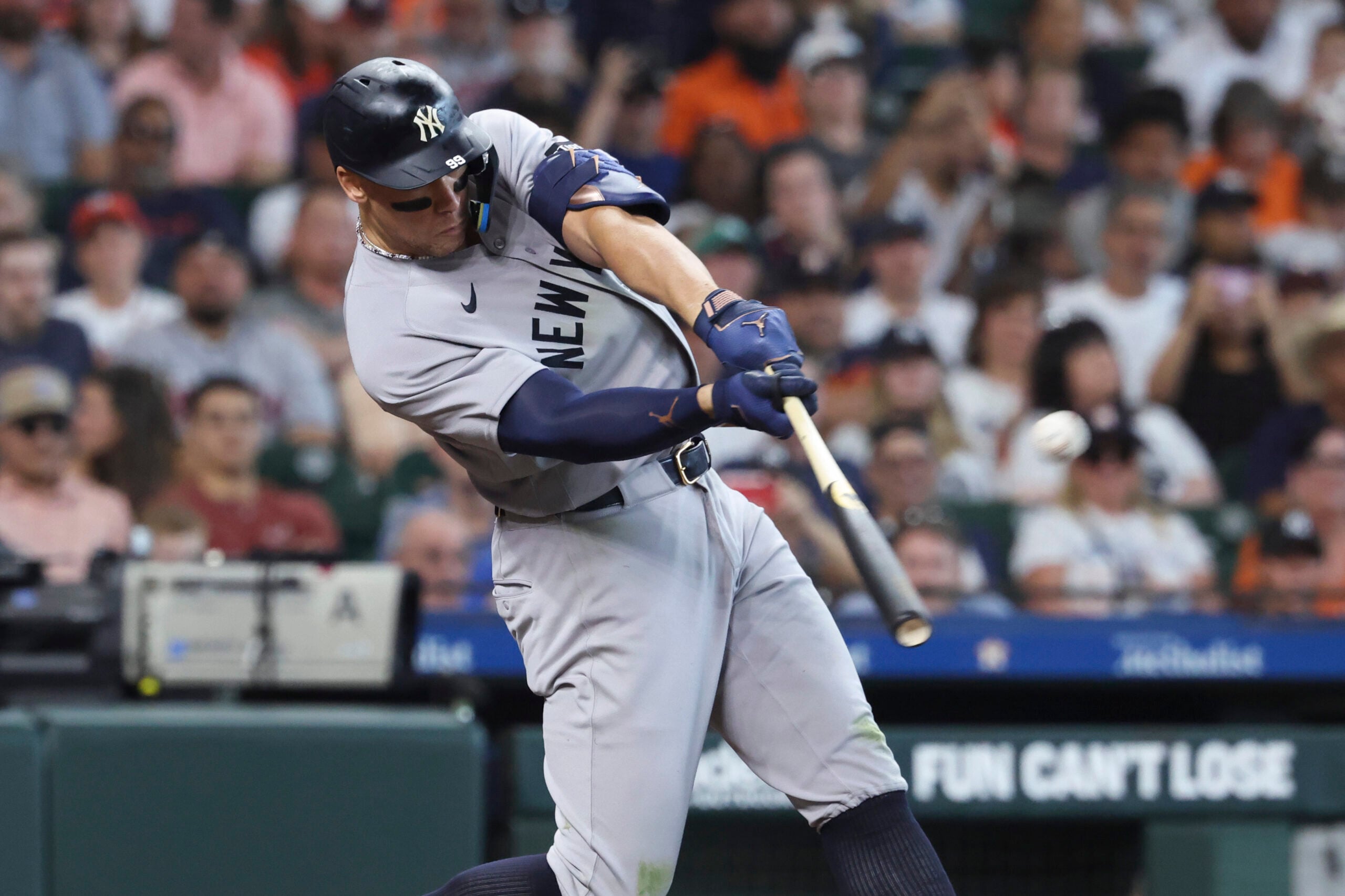 Apr 26, 2026; Houston, Texas, USA; New York Yankees right fielder Aaron Judge (99) hits a home run during the sixth inning against the Houston Astros at Daikin Park. Mandatory Credit: Troy Taormina-Imagn Images