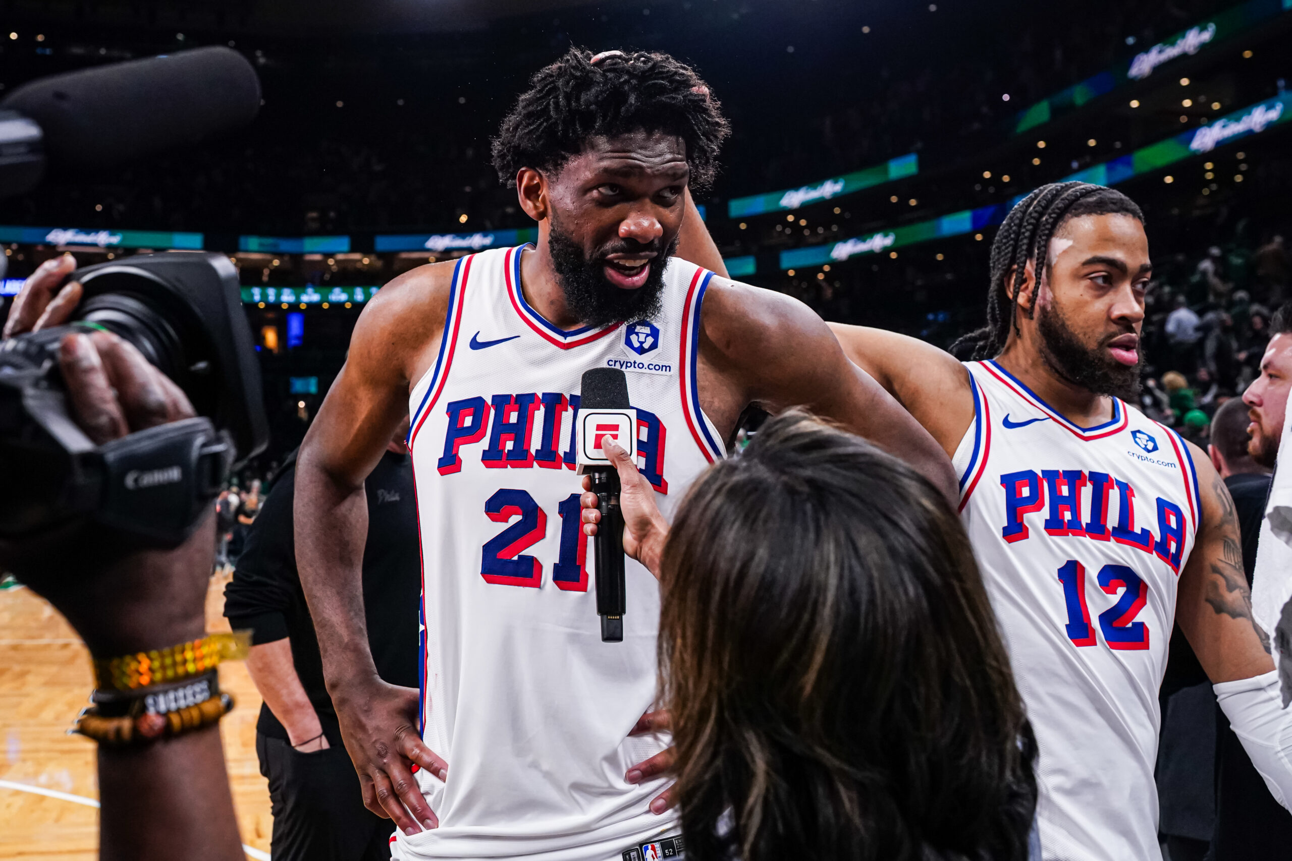Apr 28, 2026; Boston, Massachusetts, USA; Philadelphia 76ers center Joel Embiid (21) and forward Trendon Watford (12) after the game against the Boston Celtics in game five of the first round of the 2026 NBA Playoffs at TD Garden. Mandatory Credit: David Butler II-Imagn Images