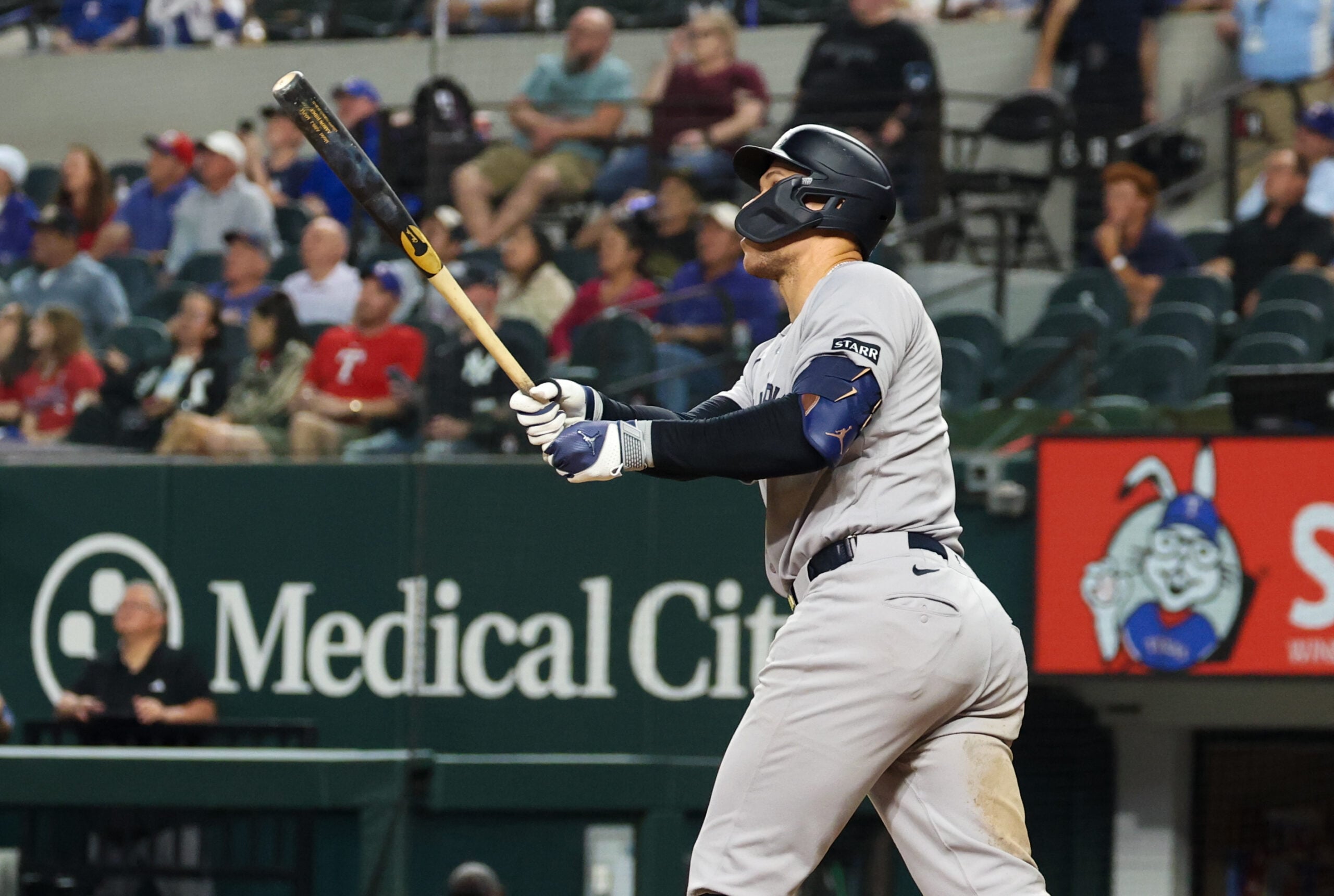 Apr 28, 2026; Arlington, Texas, USA;  New York Yankees right fielder Aaron Judge (99) hits a home run during the ninth inning against the Texas Rangers at Globe Life Field. Mandatory Credit: Kevin Jairaj-Imagn Images