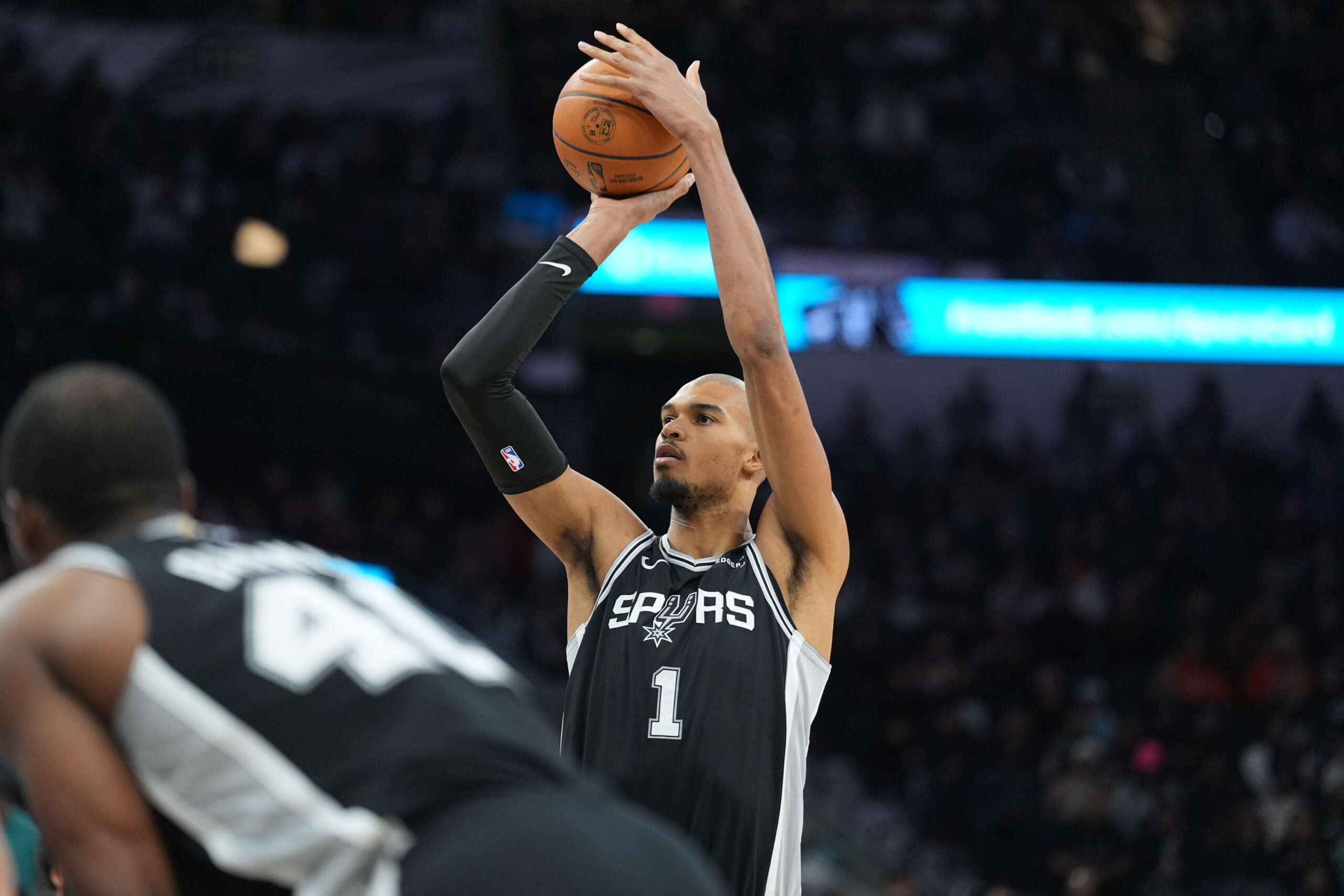 Jan 17, 2026; San Antonio, Texas, USA; San Antonio Spurs forward Victor Wembanyama (1) shoots a free throw in the second half against the Minnesota Timberwolves at Frost Bank Center. Mandatory Credit: Daniel Dunn-Imagn Images
