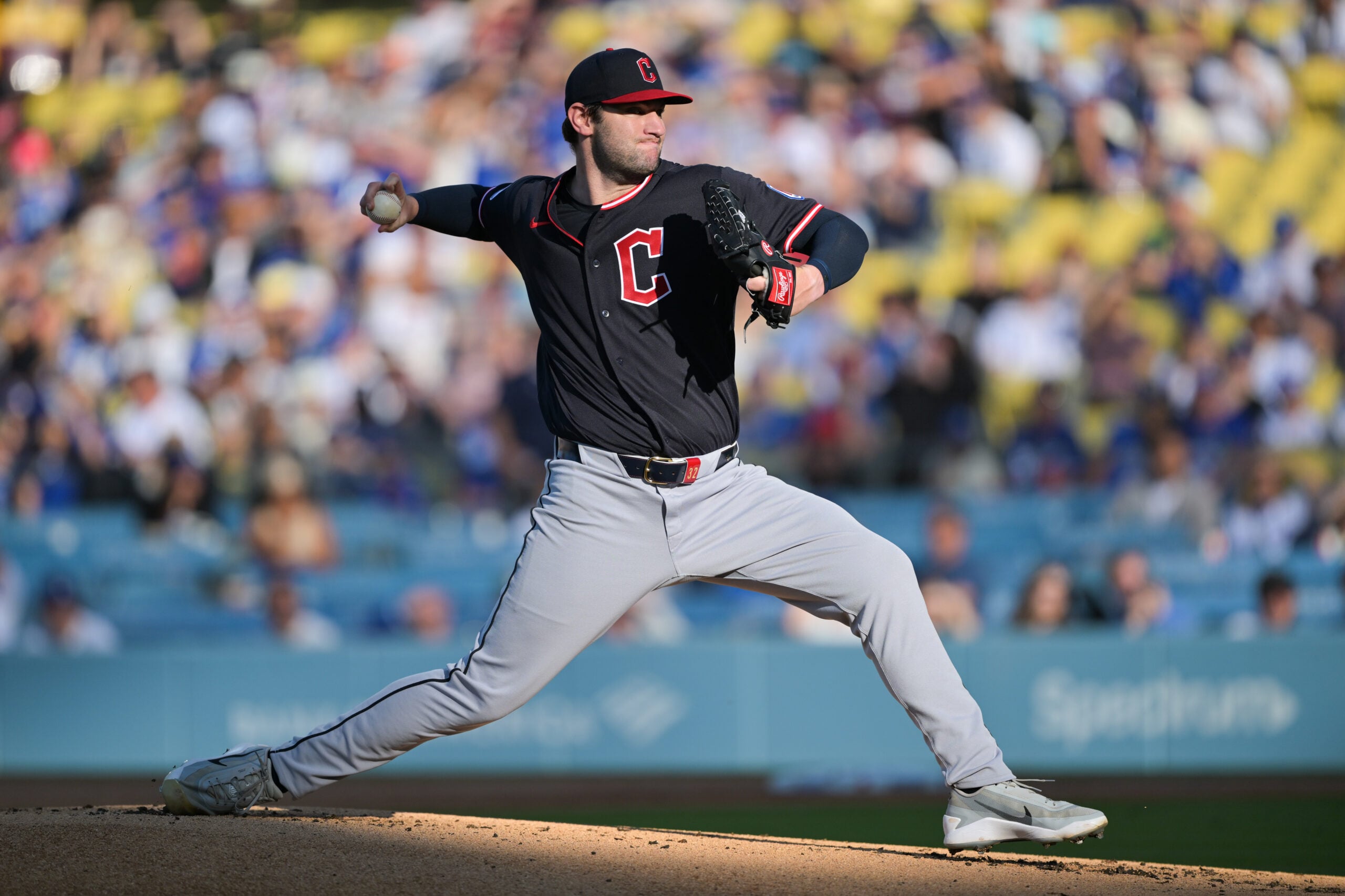 Apr 1, 2026; Los Angeles, California, USA;  Cleveland Guardians pitcher Gavin Williams (32) pitches during the first inning against the Los Angeles Dodgers at Dodger Stadium. Mandatory Credit: Jayne Kamin-Oncea-Imagn Images