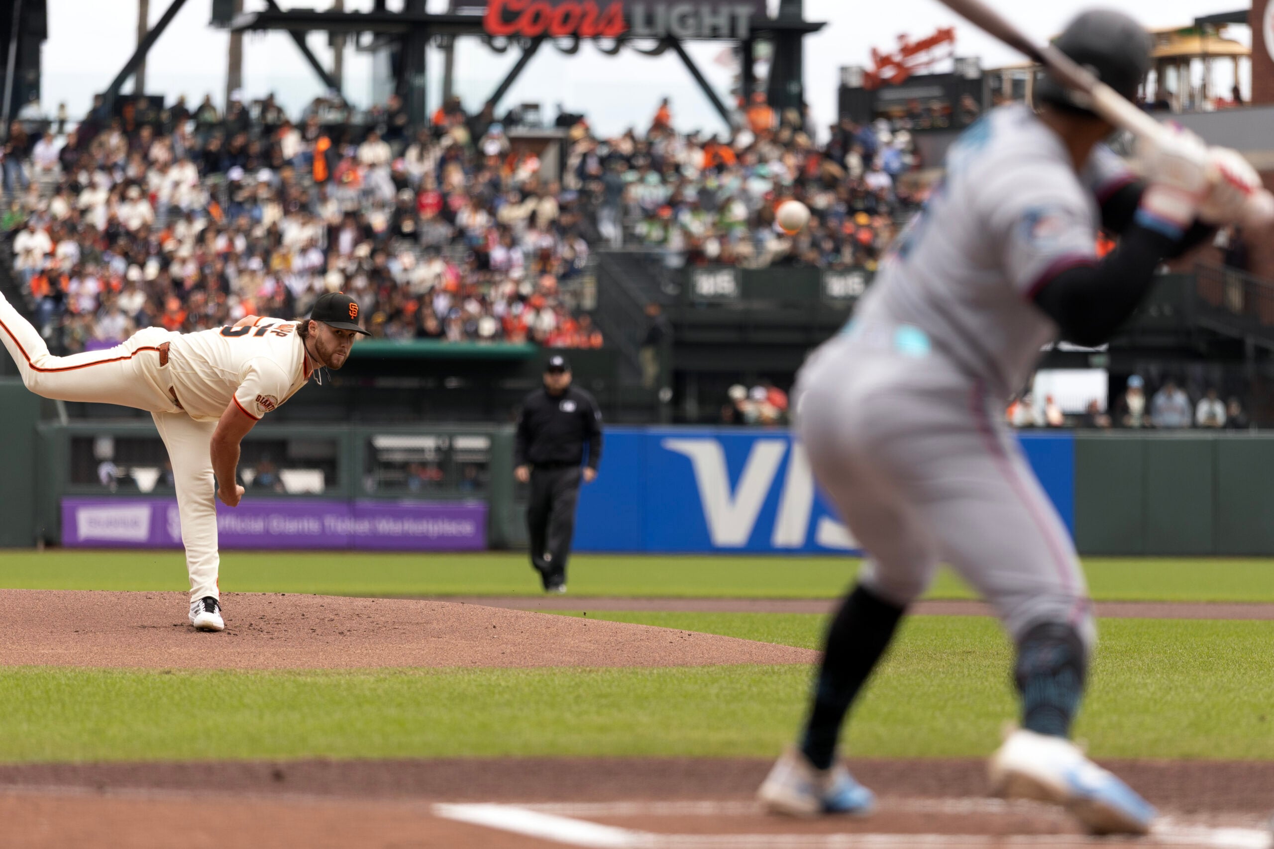 Apr 26, 2026; San Francisco, California, USA; San Francisco Giants starting pitcher Landen Roupp (65) delivers a pitch against the Miami Marlins during the first inning at Oracle Park. Mandatory Credit: D. Ross Cameron-Imagn Images