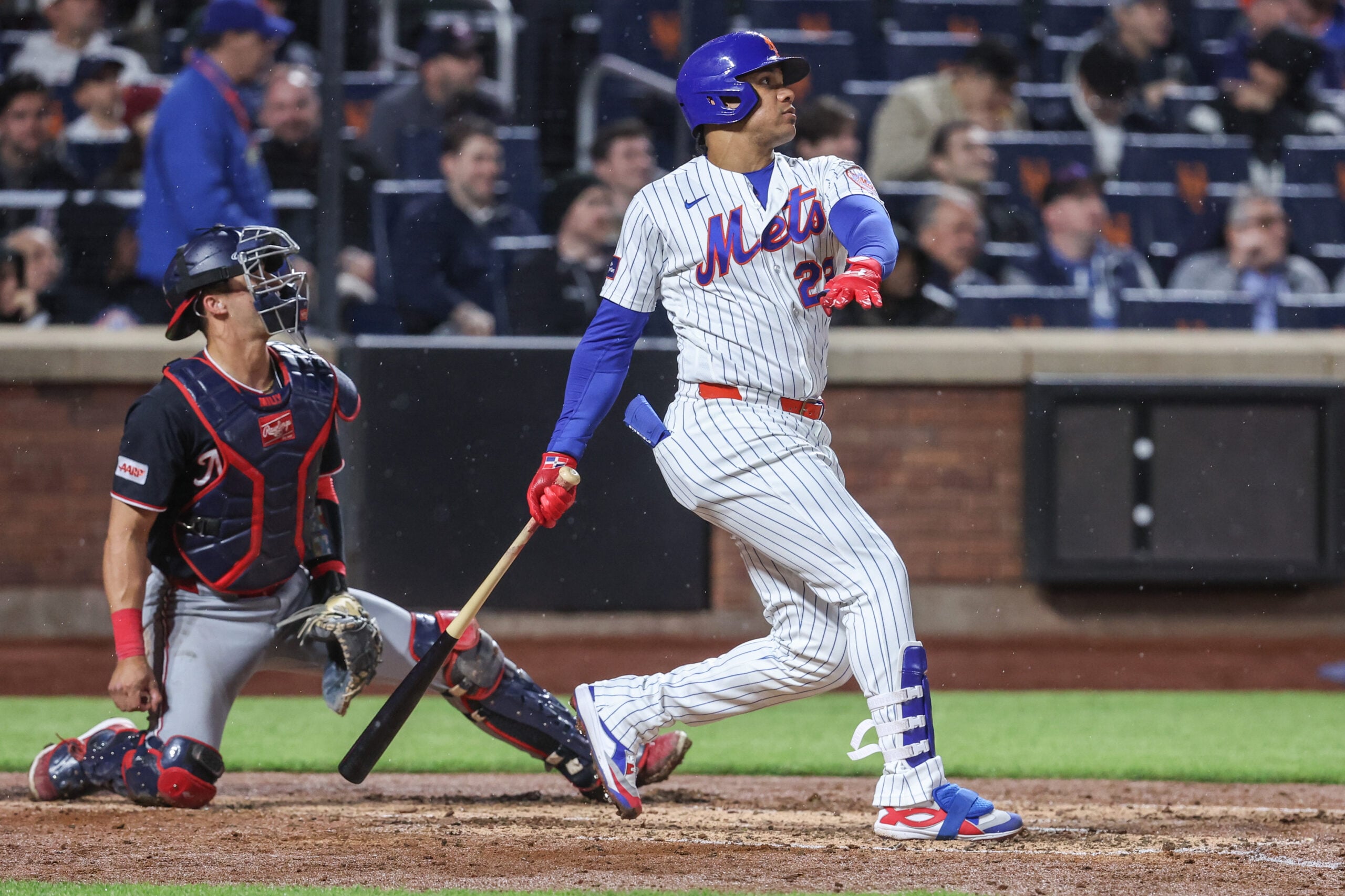 Apr 28, 2026; New York City, New York, USA;  New York Mets designated hitter Juan Soto (22) hits a two run home run in the fourth inning against the Washington Nationals at Citi Field. Mandatory Credit: Wendell Cruz-Imagn Images
