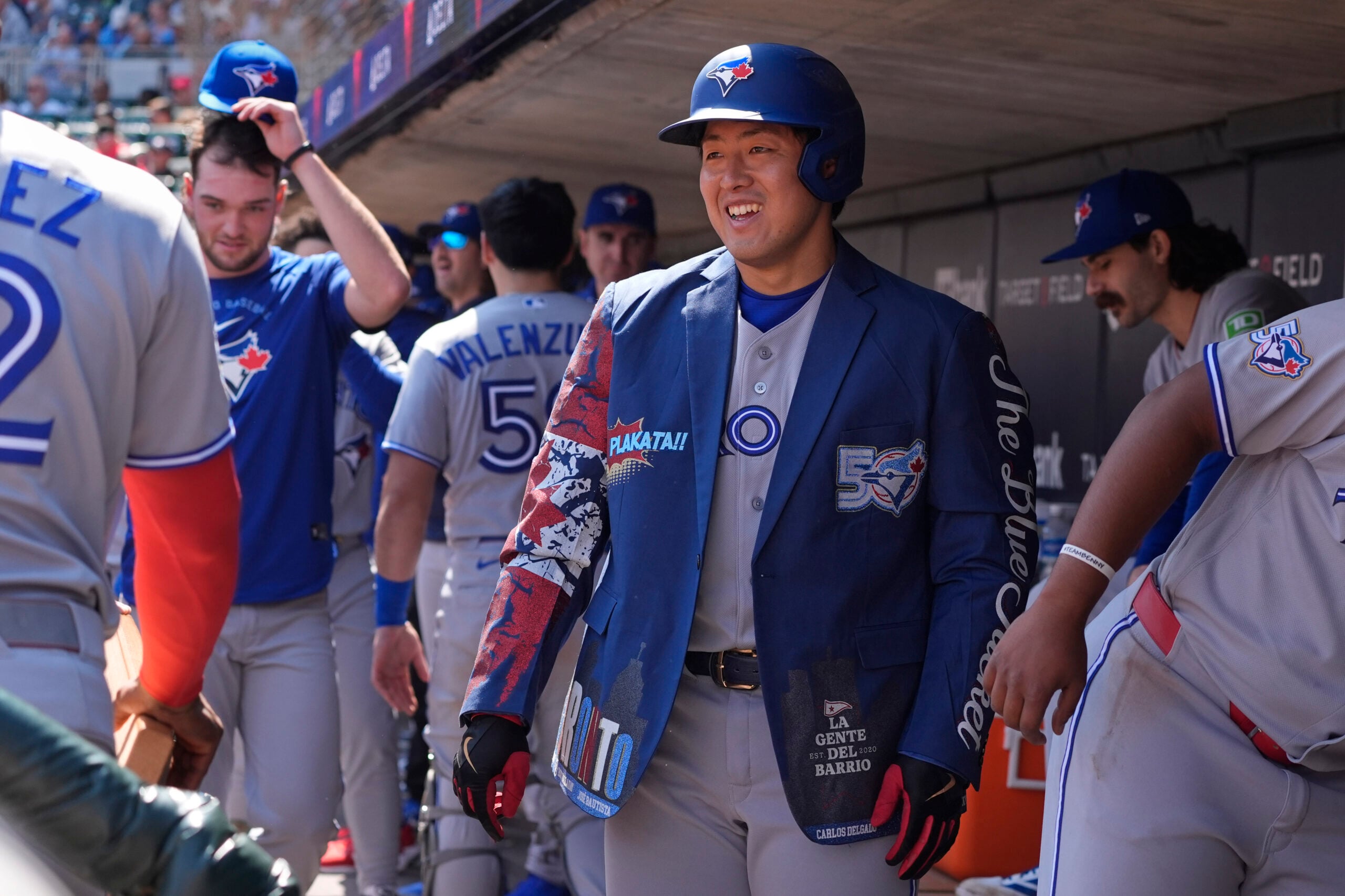 May 2, 2026; Minneapolis, Minnesota, USA; Toronto Blue Jays third baseman Kazuma Okamoto (7) celebrates his solo home run against the Minnesota Twins in the sixth inning at Target Field. Mandatory Credit: Bruce Kluckhohn-Imagn Images