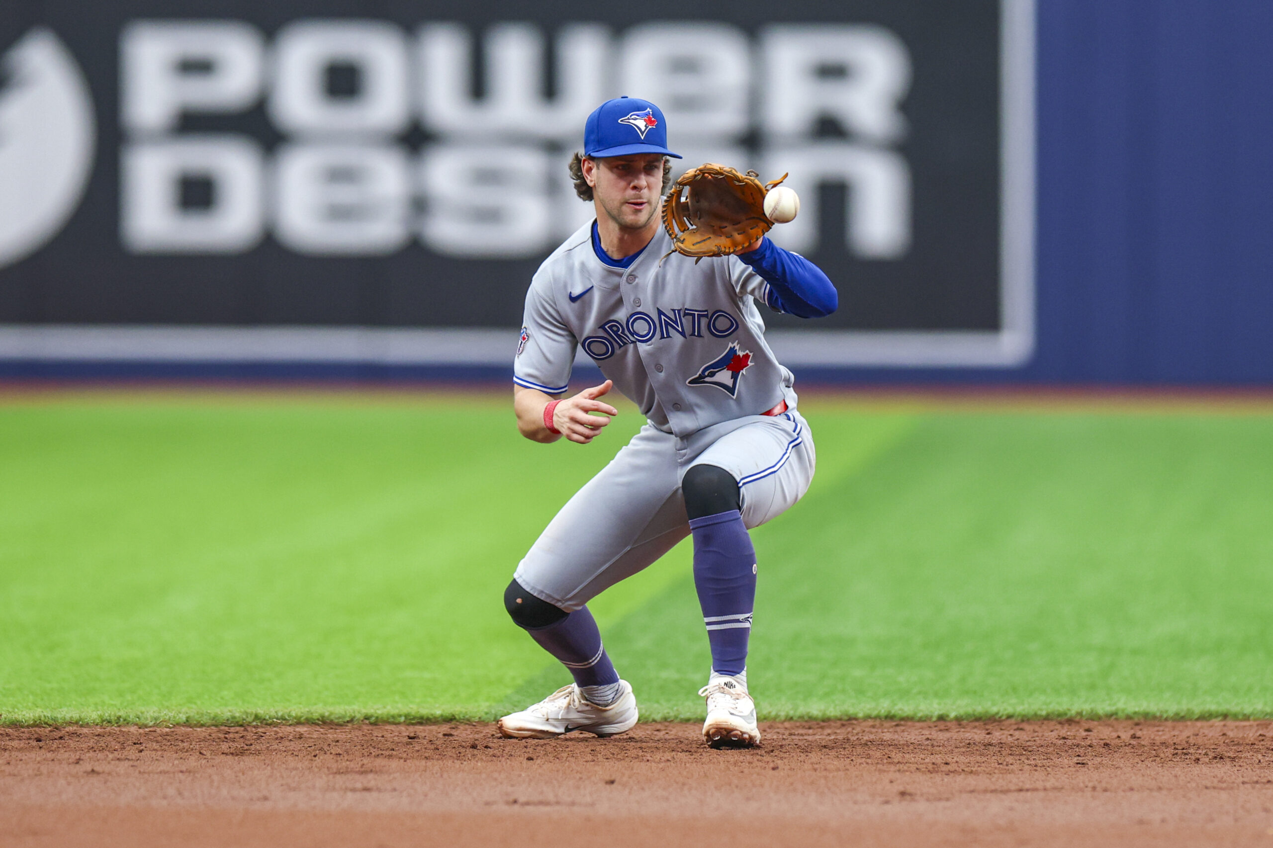 May 6, 2026; St. Petersburg, Florida, USA; Toronto Blue Jays shortstop Ernie Clement (22) fields the ball against the Tampa Bay Rays in the second inning at Tropicana Field. Mandatory Credit: Nathan Ray Seebeck-Imagn Images